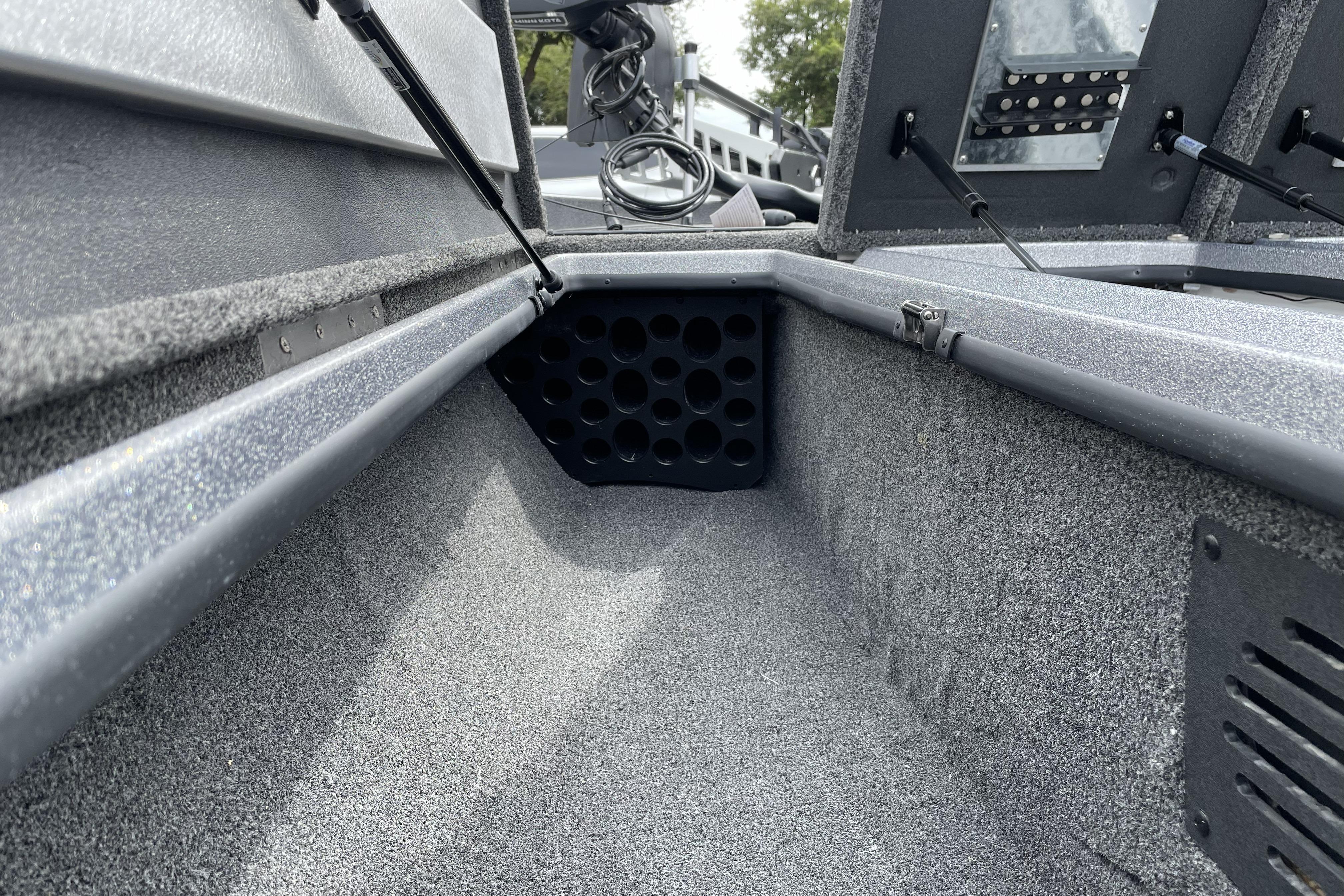 Interior view of 2026 Nitro Z21 XL boat storage compartment with rod holders.
