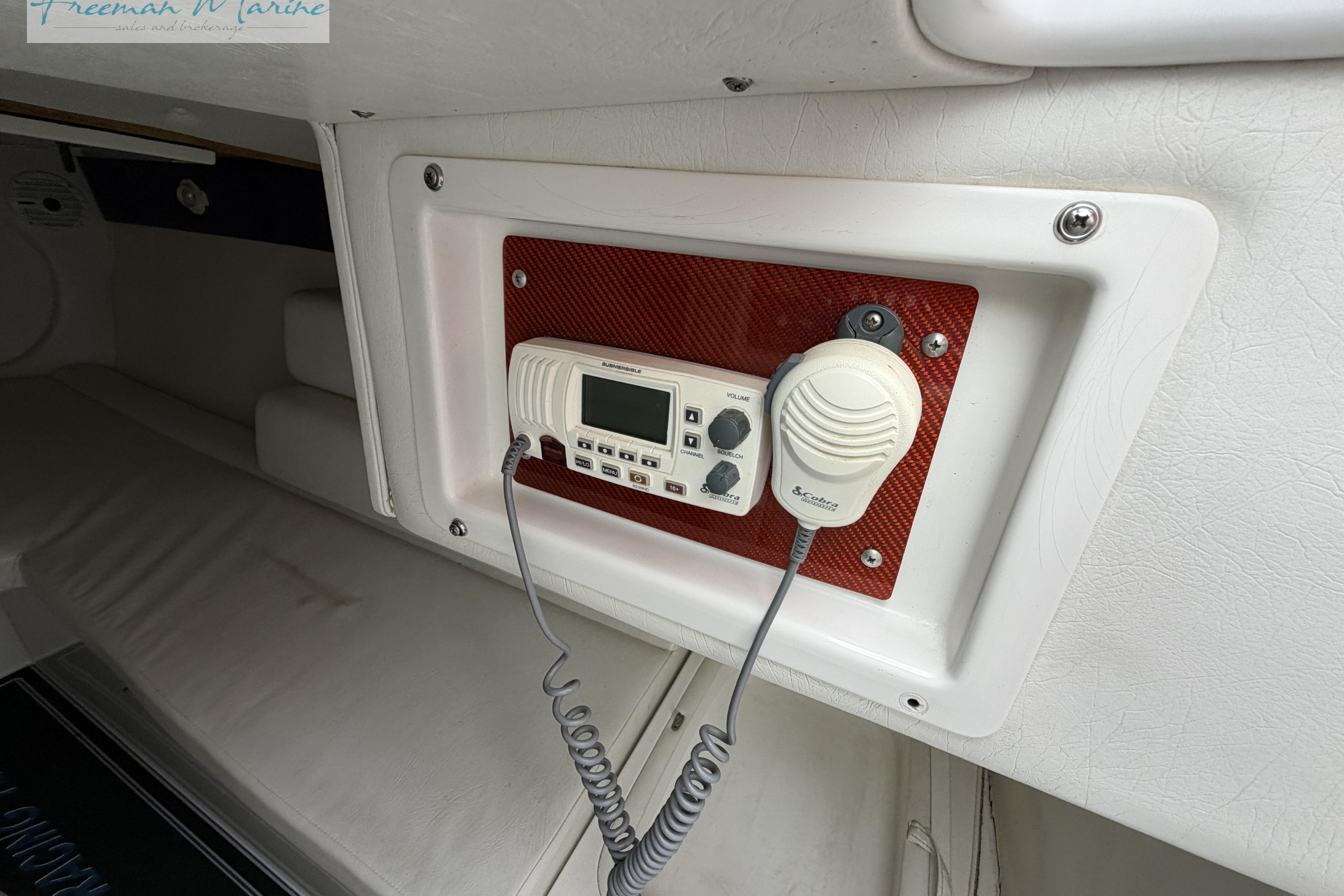 VHF radio installed in a 2000 Cigarette 30' Mystique boat interior.