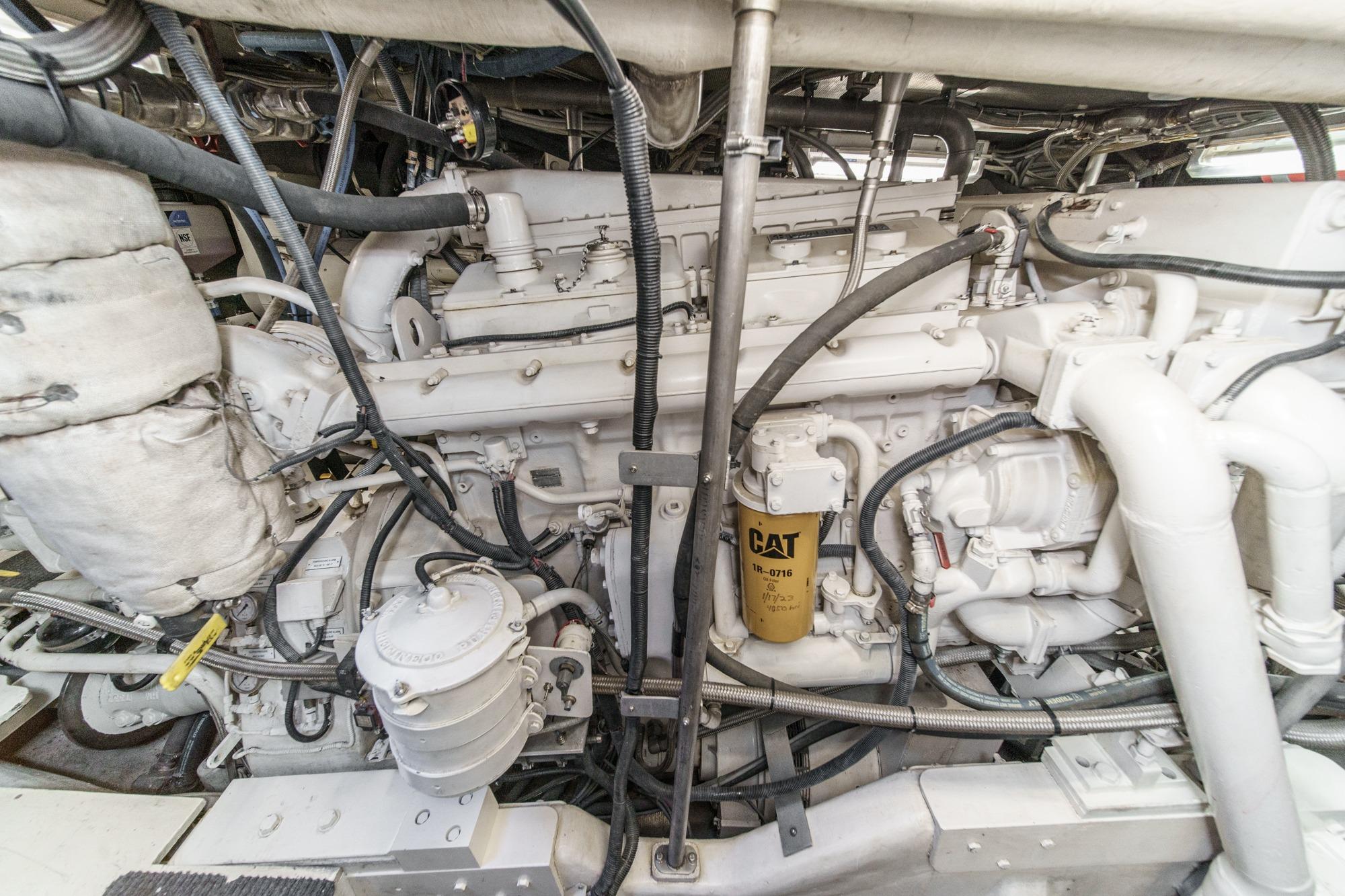 Engine room of a 1990 Seaton Long Range Cruiser with visible CAT filter.