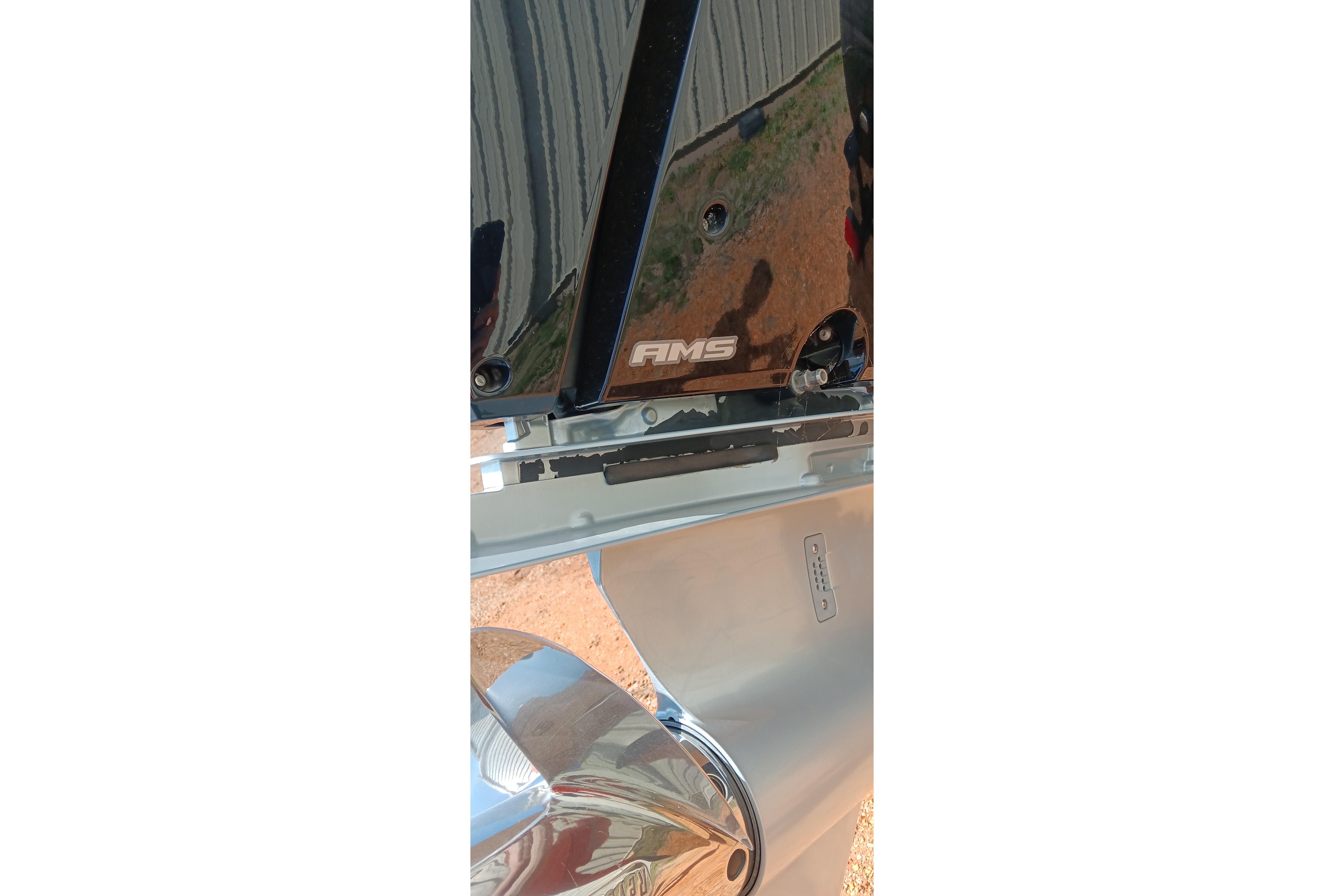 2023 Ranger 2500LS boat detail with AMS logo and metallic components.