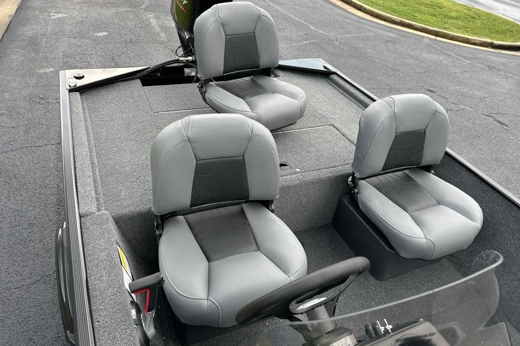 2026 Tracker Bass Tracker Classic XL boat interior with three gray seats.