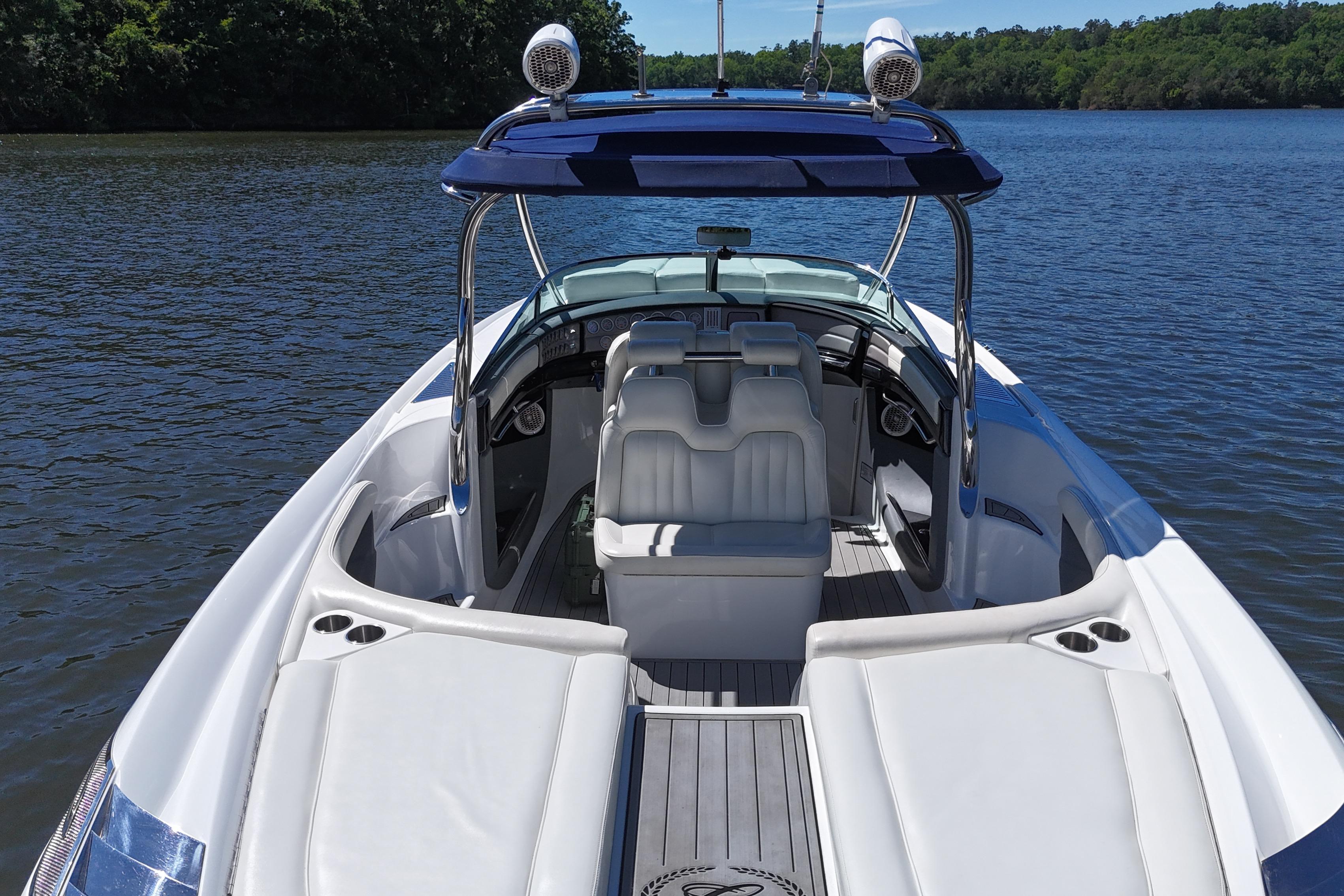 2007 Cobalt 343 boat with sleek interior on a serene lake.