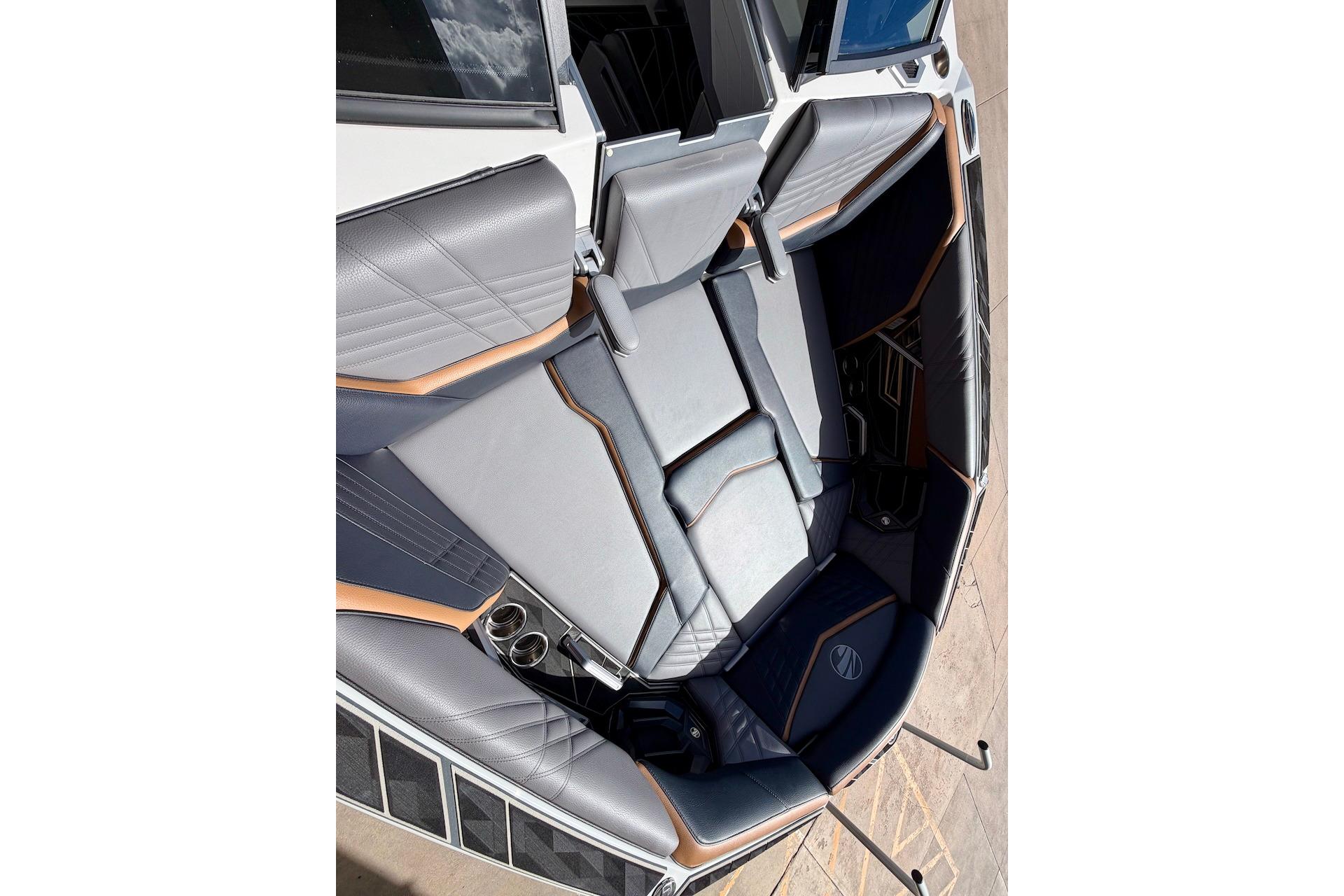 2025 Tigé Ultré 25ZX boat interior with luxurious seating and modern design.