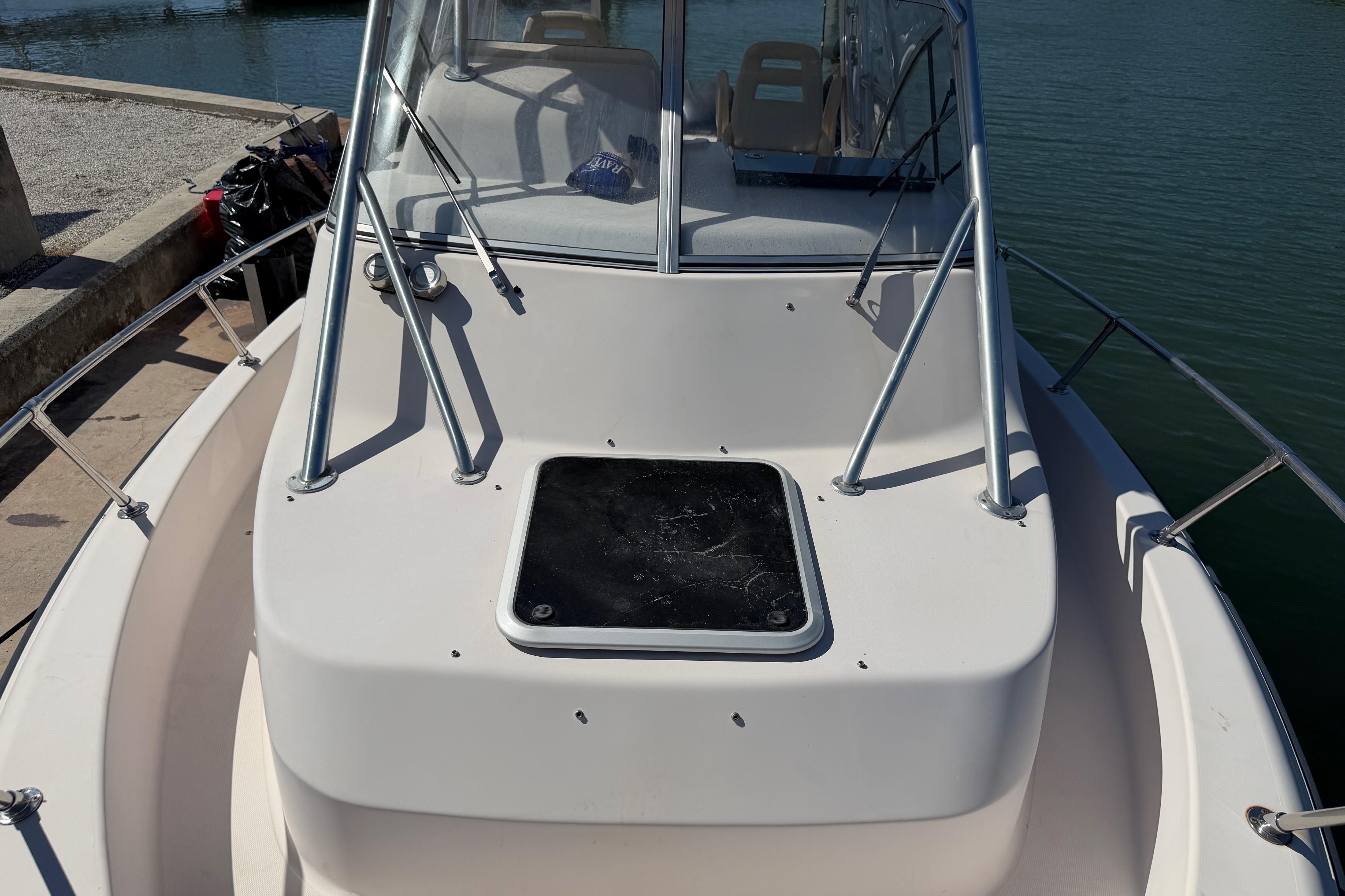 2006 Grady-White Sailfish 282 boat docked, showcasing bow and windshield design.