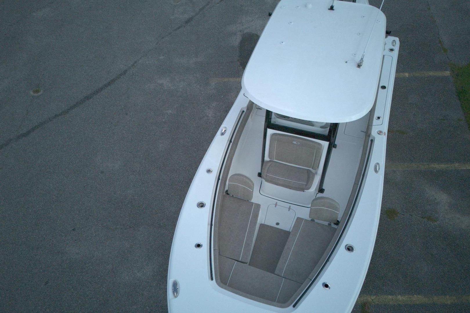 2026 Sea Hunt Gamefish 25 boat, aerial view, showcasing spacious deck and seating.