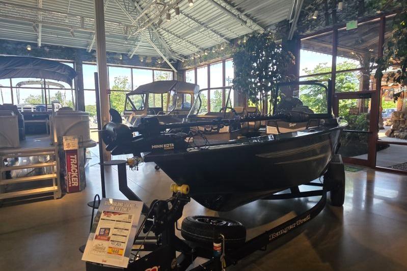 2026 Ranger VX1788 WT boat displayed in a showroom with large windows.