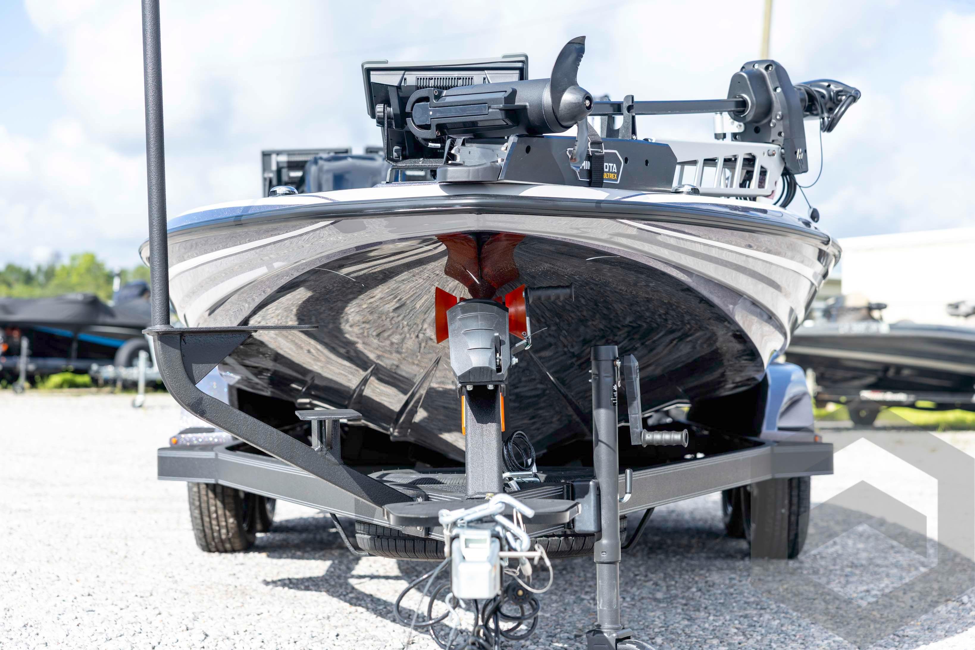 2026 Skeeter FXR20 FLEX boat on trailer, front view, outdoors.