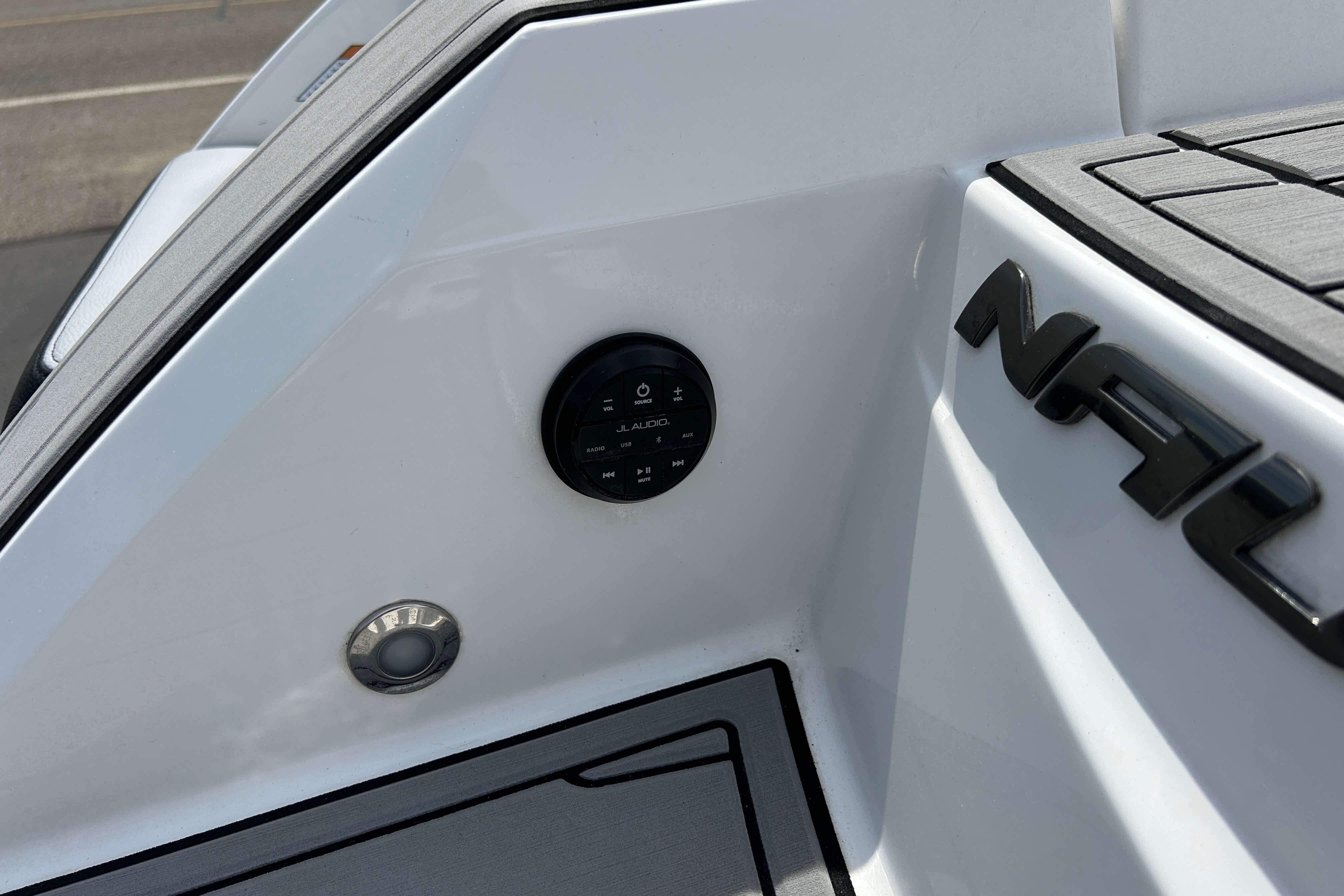 2021 Nautique Super Air Nautique GS24 boat detail with JL Audio control panel.