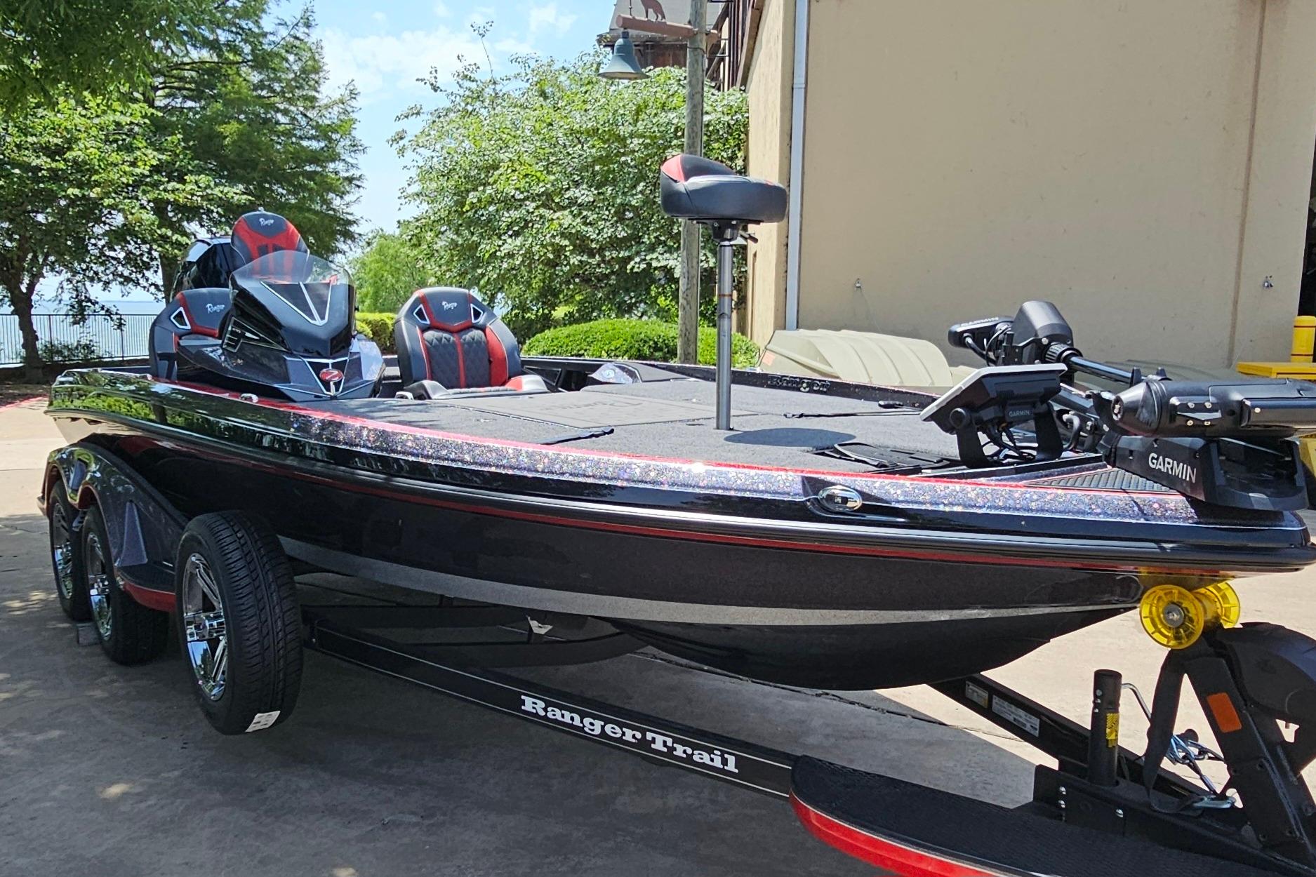 2026 Ranger Z520R boat with sleek design, parked outdoors, featuring Garmin equipment.