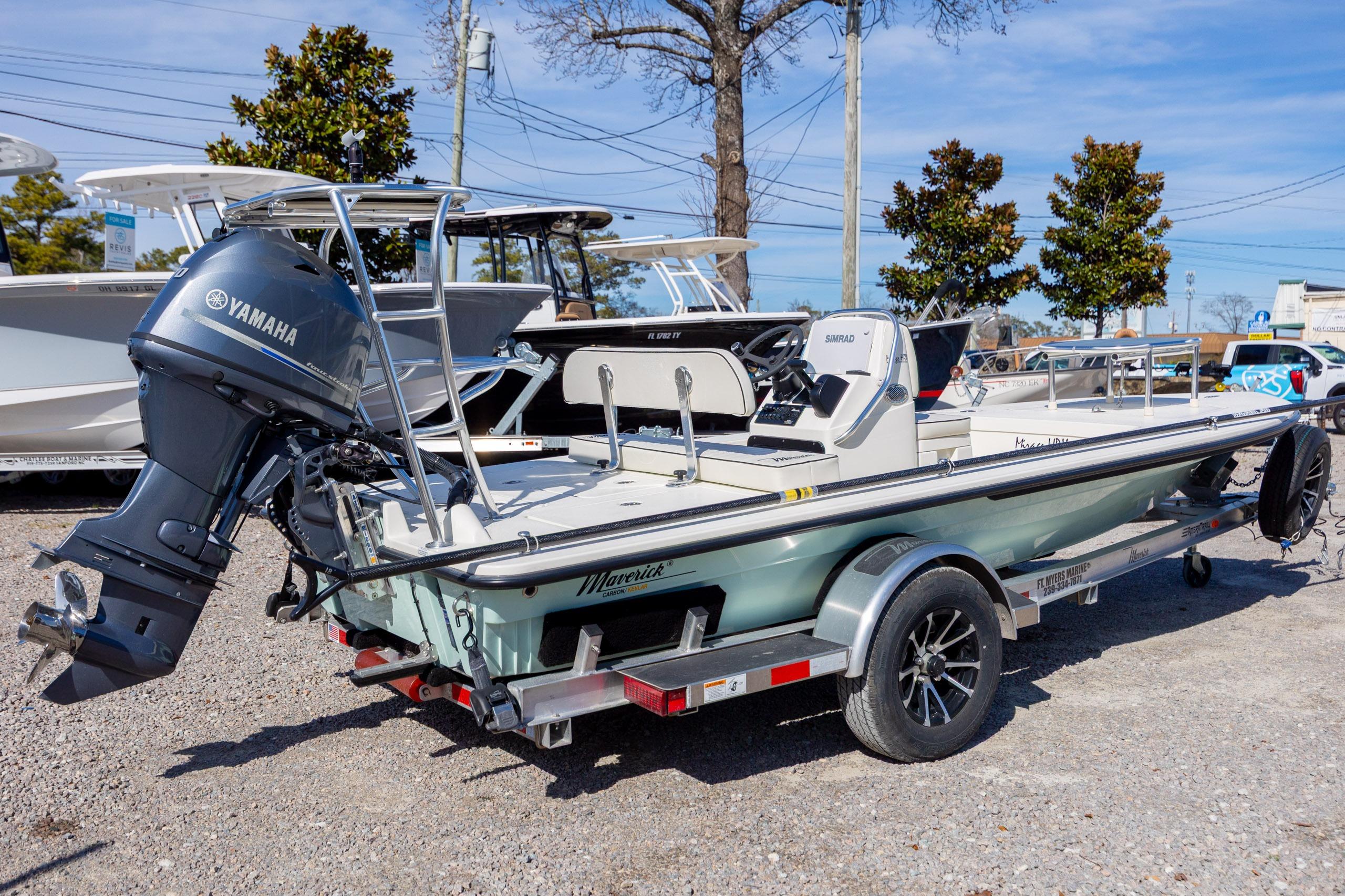2024 Maverick 17 HPX-S boat with Yamaha engine on trailer, parked outdoors.