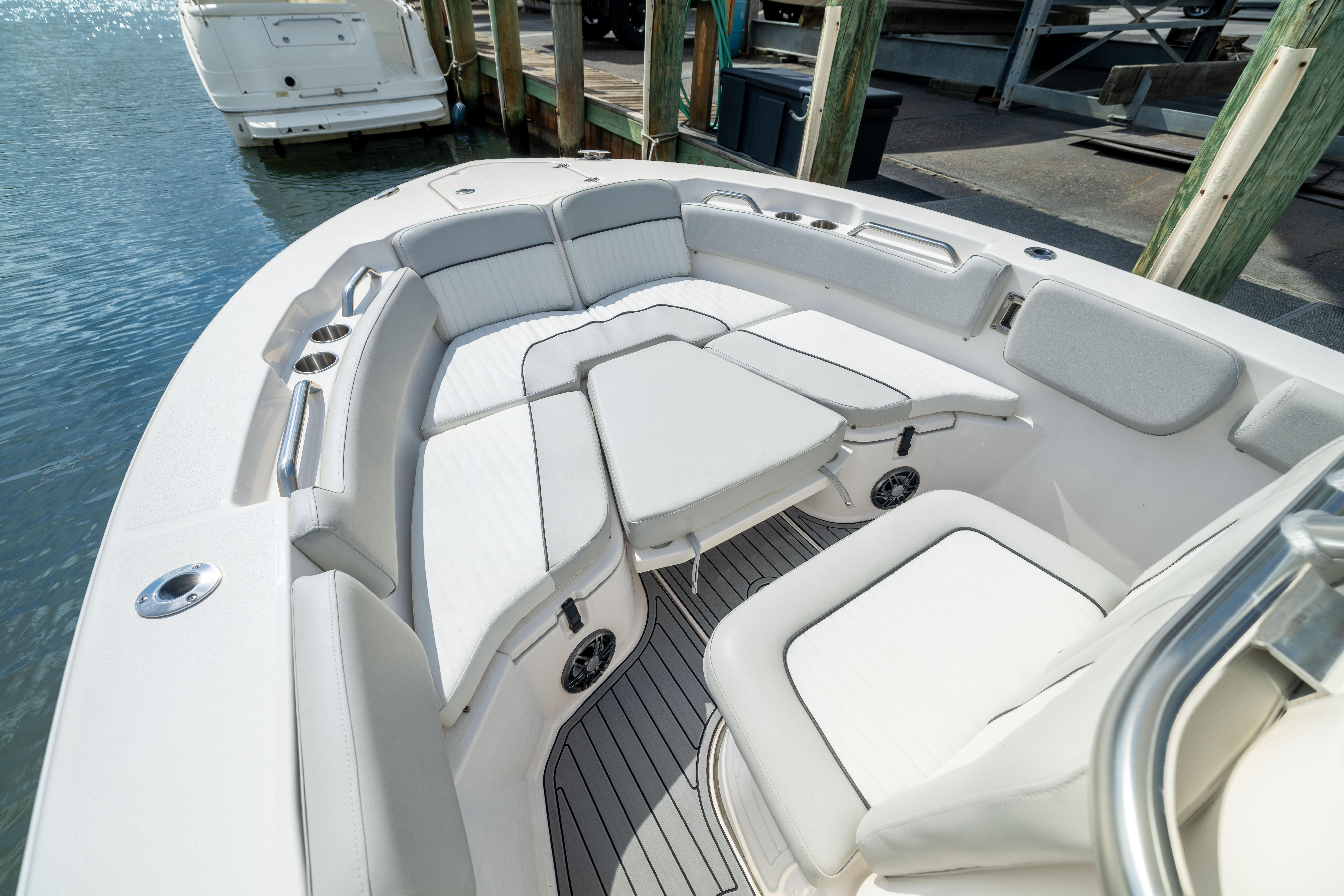 2023 Sea Fox 228 Commander boat interior with cushioned seating and sleek design.