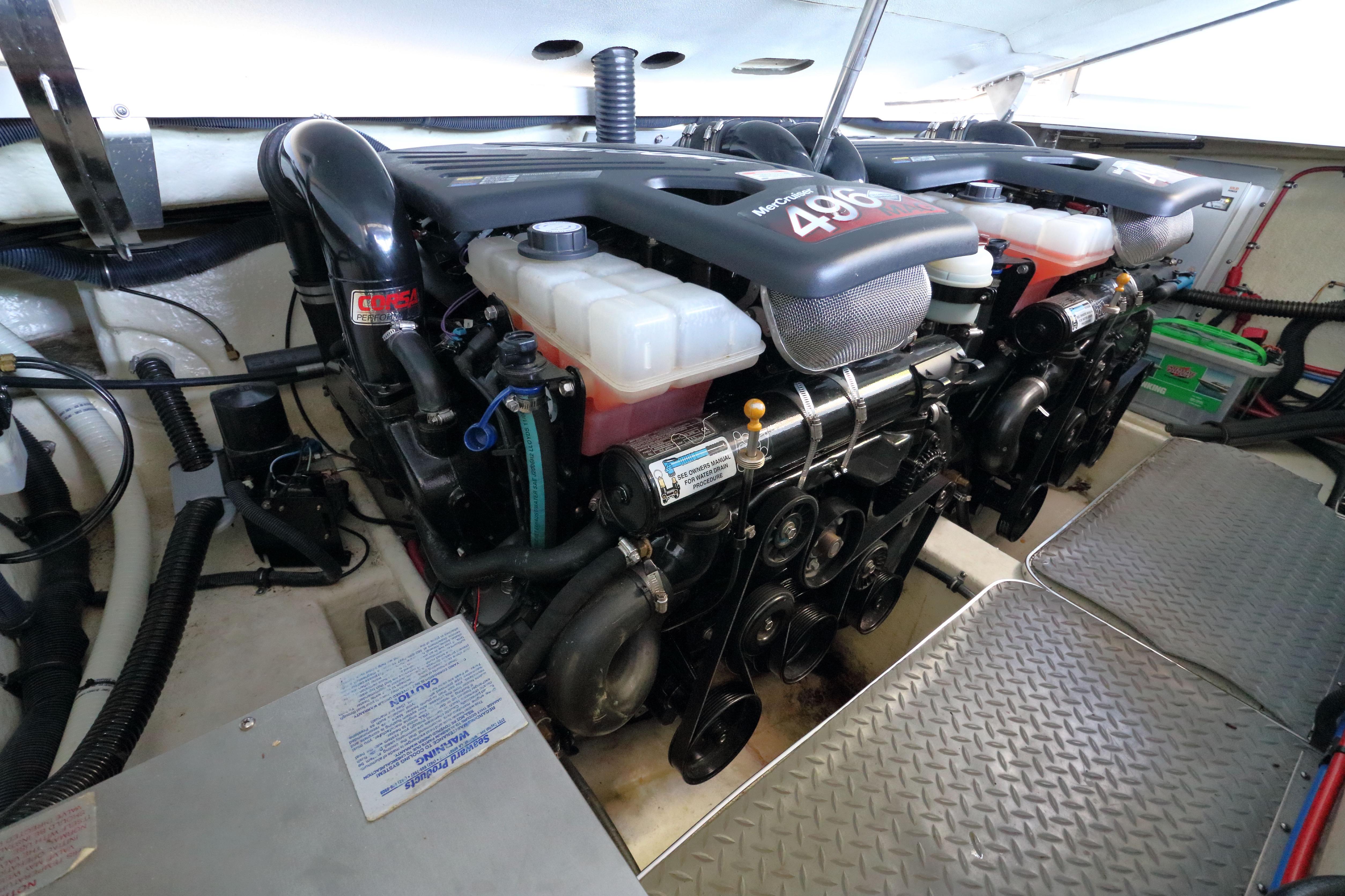 Engine room of a 2006 Formula 330 Sun Sport boat, featuring dual MerCruiser engines.