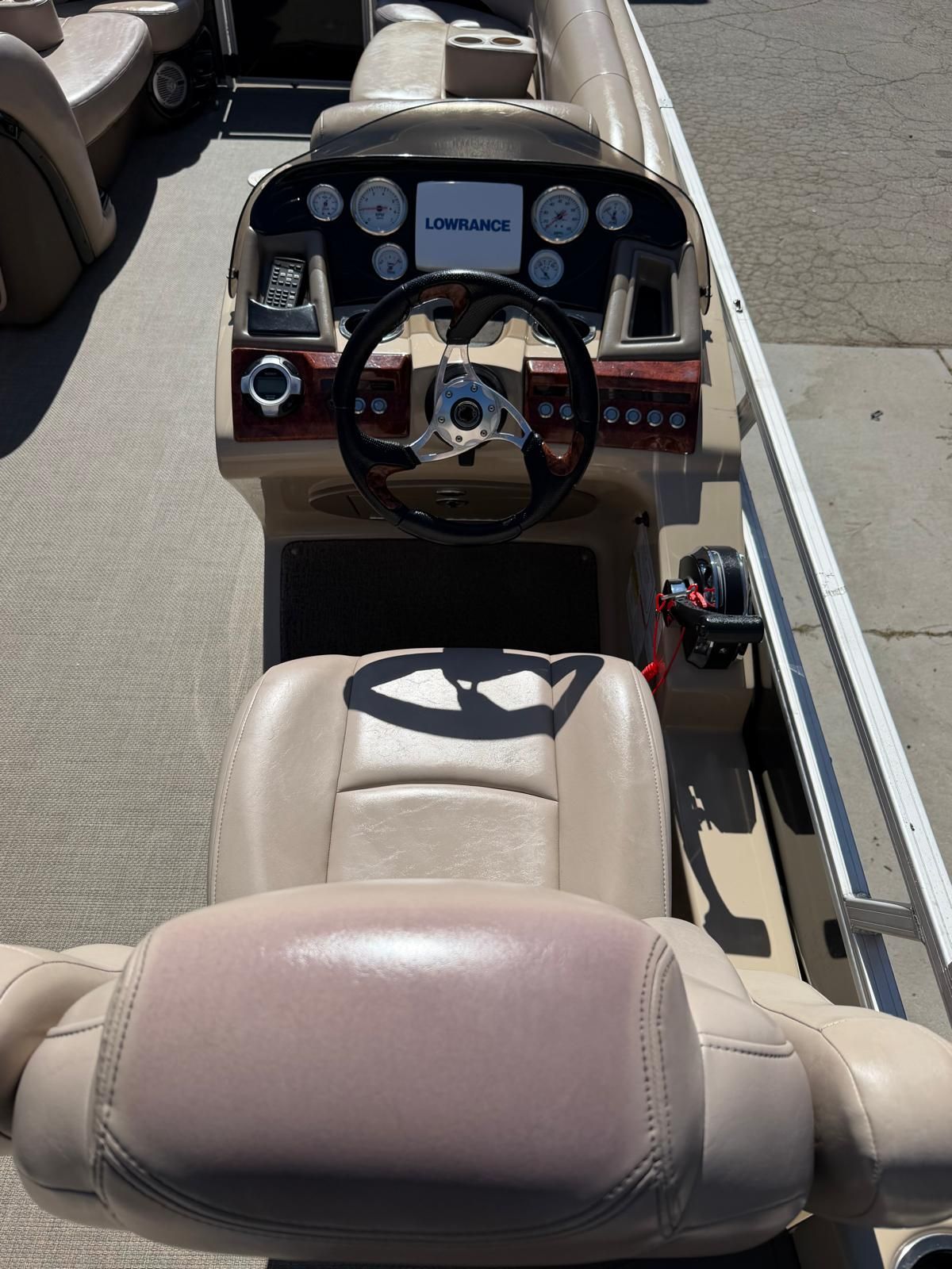 Interior view of a 2015 Regency 220DL3 boat cockpit.