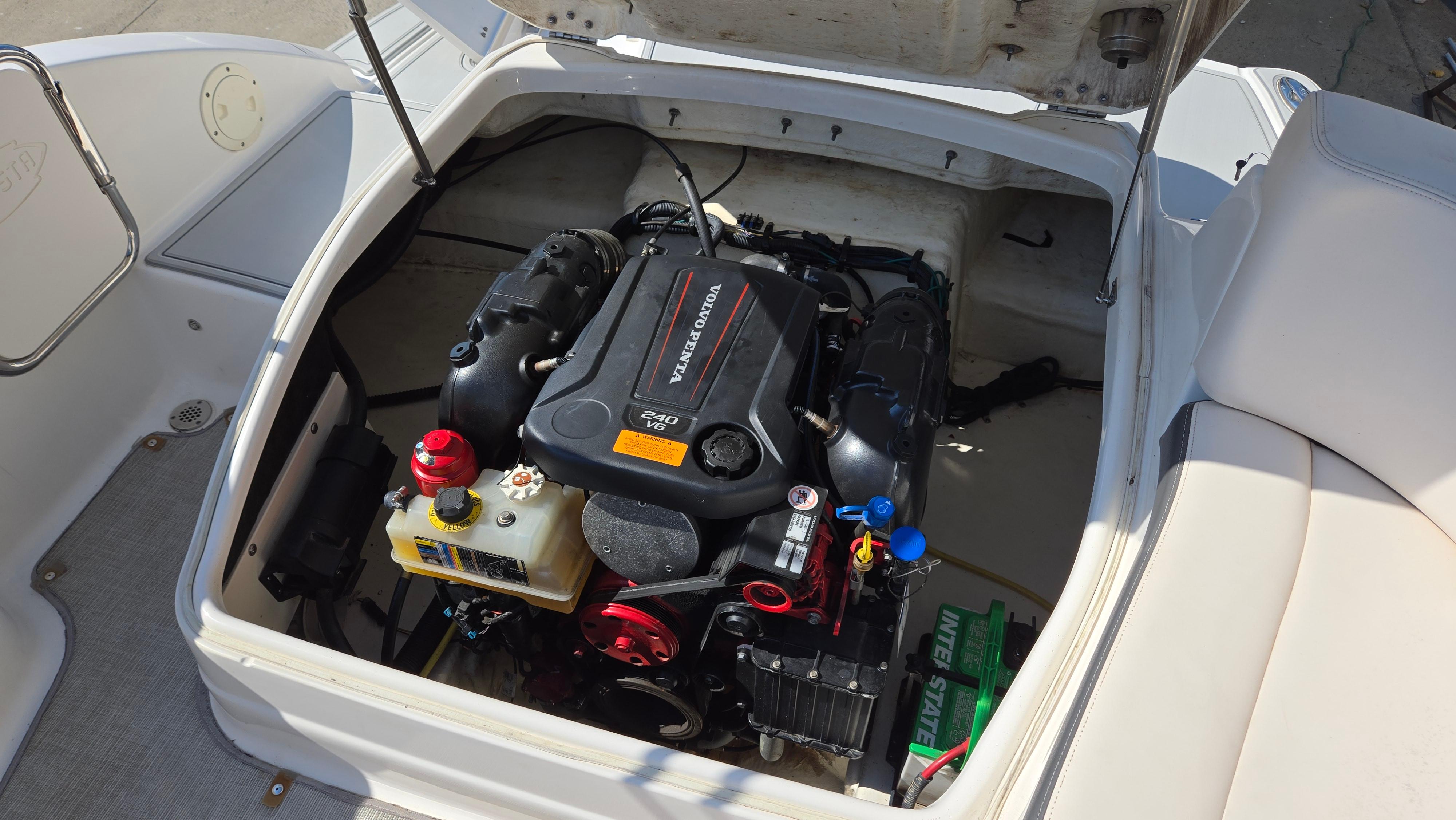 2018 Chaparral 224 Sunesta boat engine compartment with Volvo Penta engine.