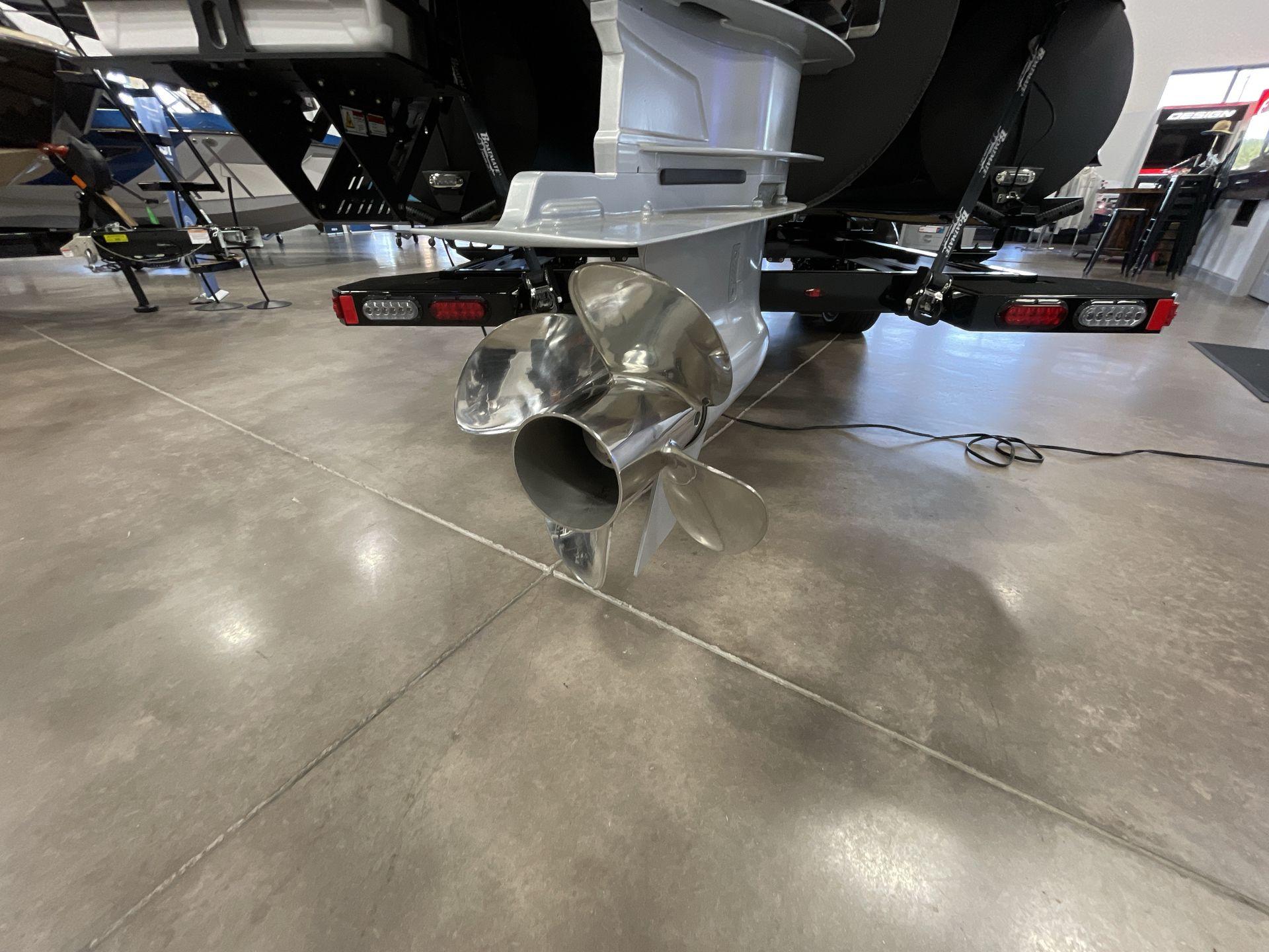 Propeller of 2025 Balise Horizon 26C boat in showroom setting.