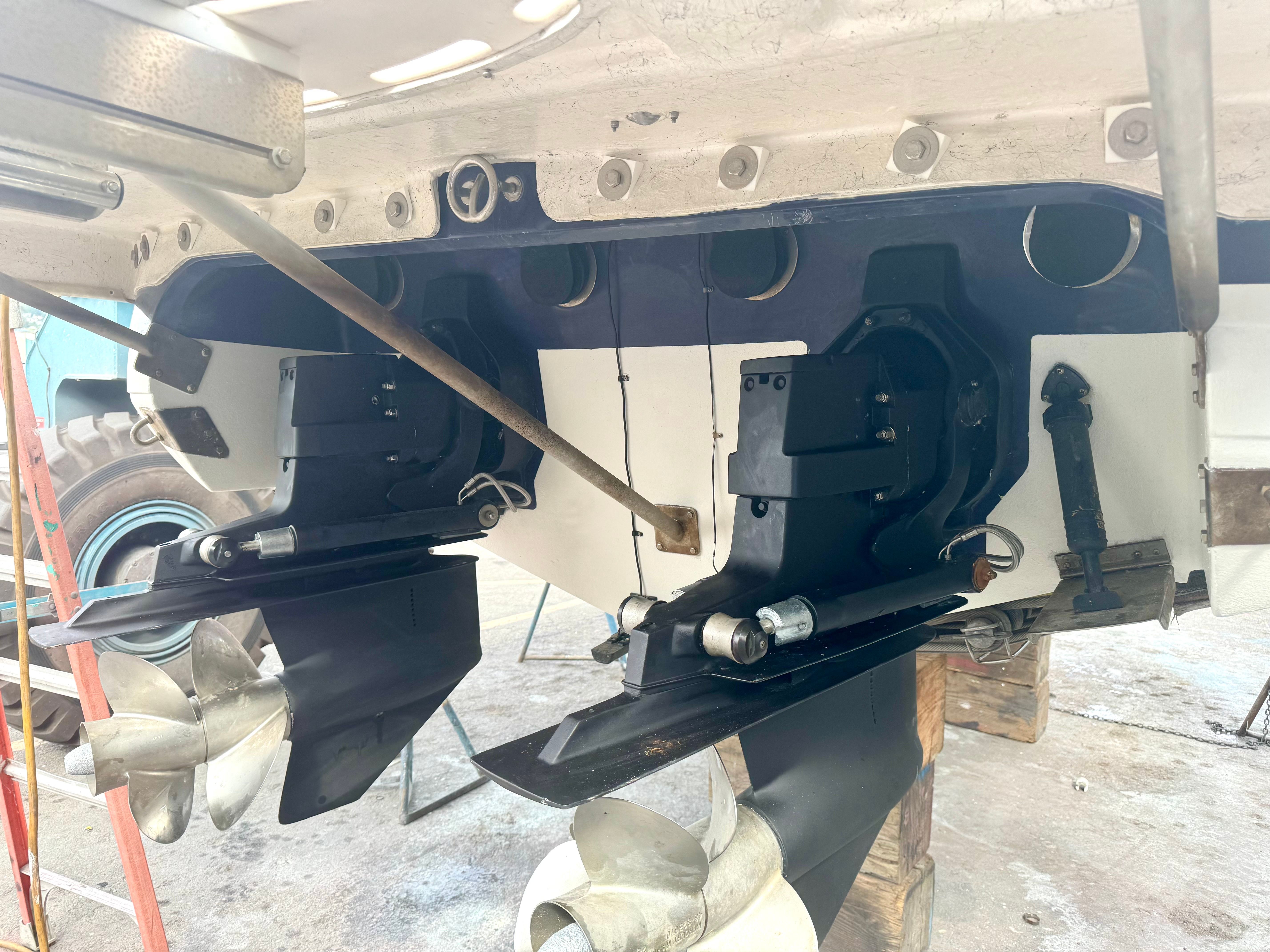 Rear view of a 1999 Cobalt 293 boat with dual engines.