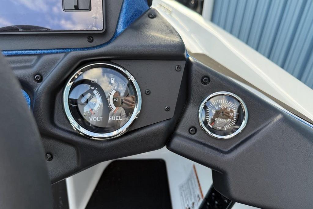 Dashboard of 2026 Skeeter ZXR19 SE with volt, fuel, and water pressure gauges.