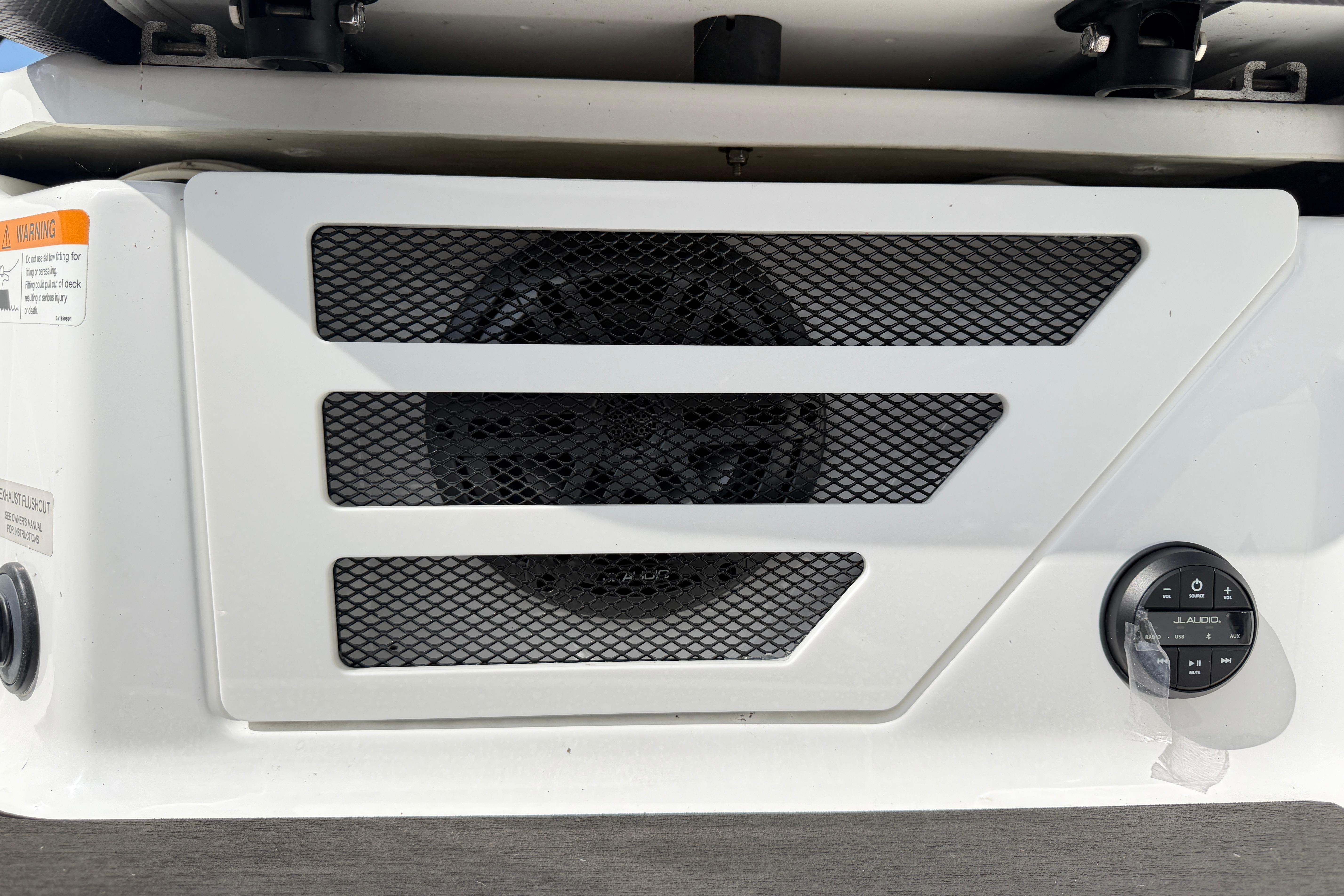 Speaker system and control panel on 2026 Scarab 235 LX boat.