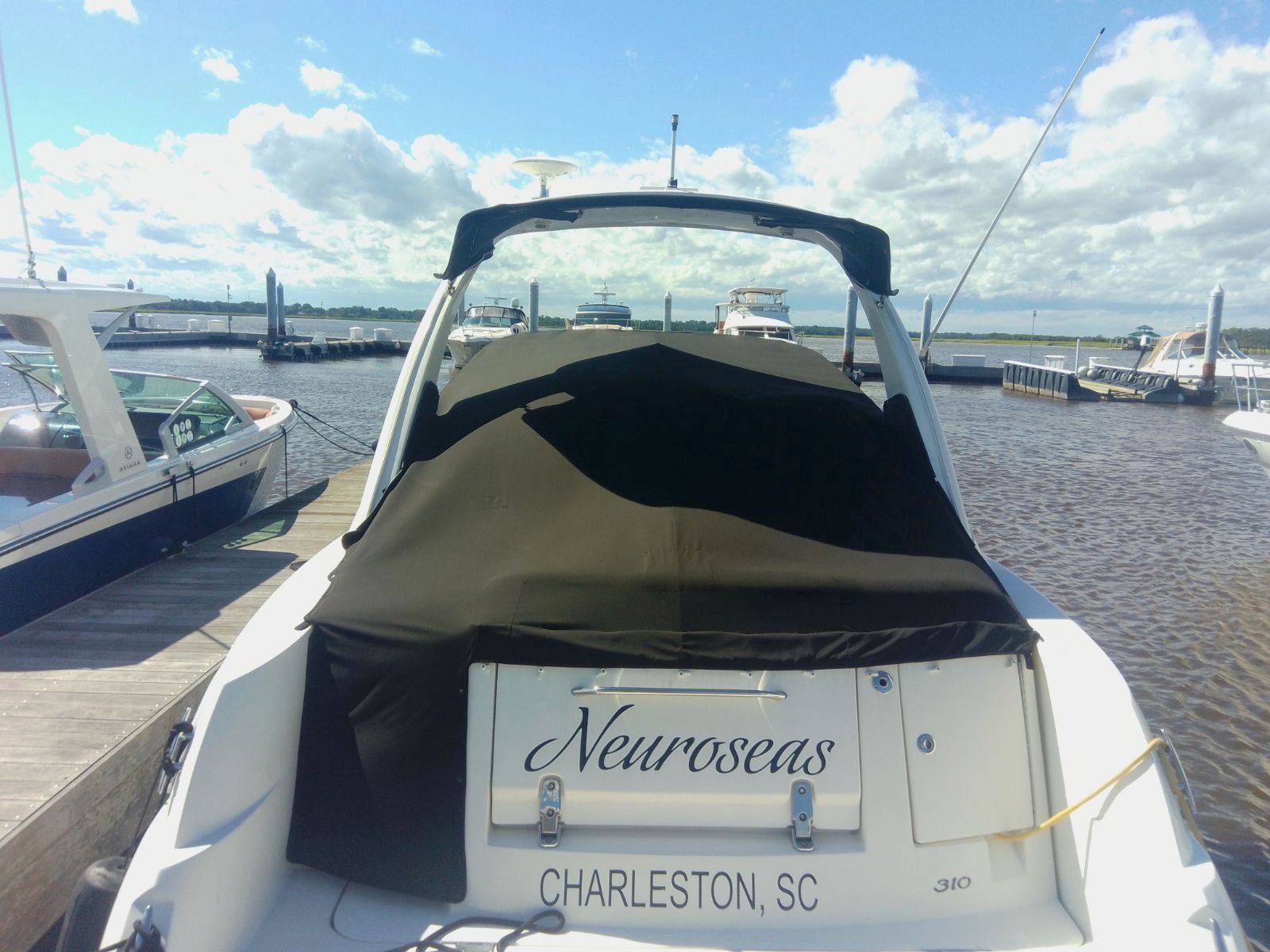 2007 Sea Ray Sundancer 310 boat docked in Charleston, SC harbor.