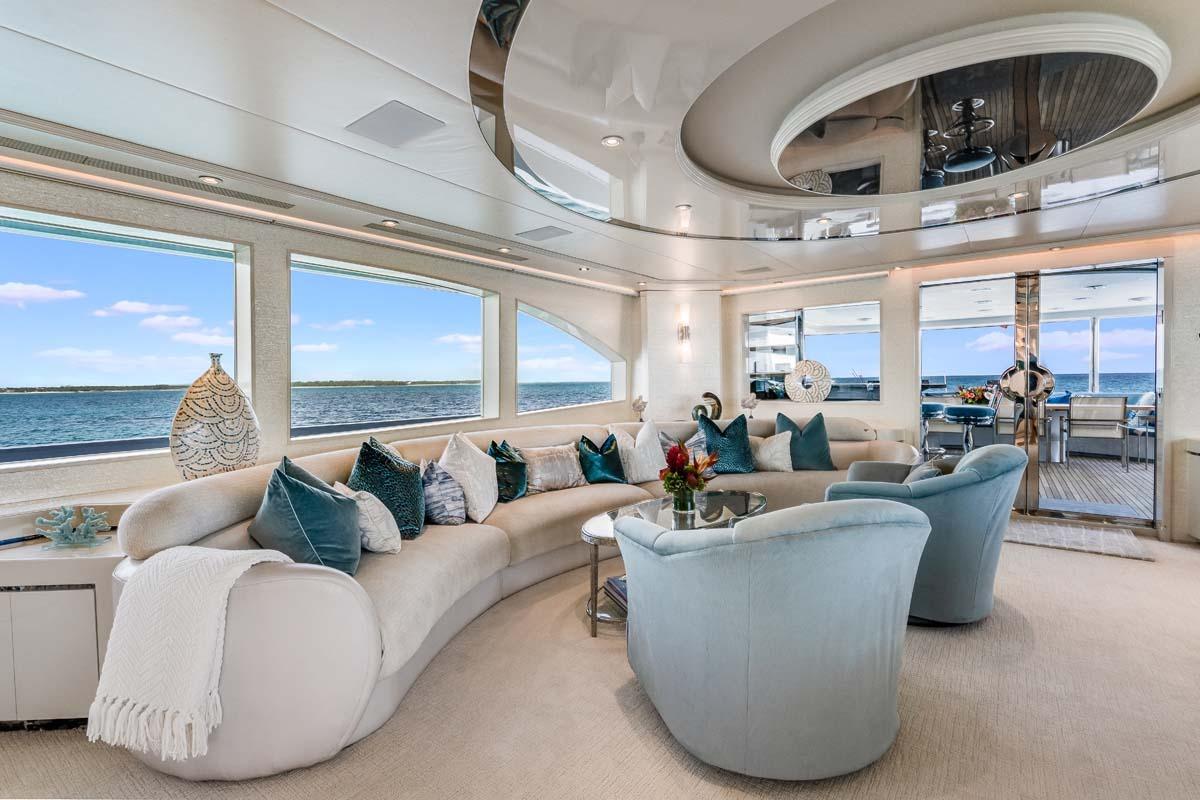 Luxurious 2001 Westship Skylounge interior with elegant seating and ocean views.