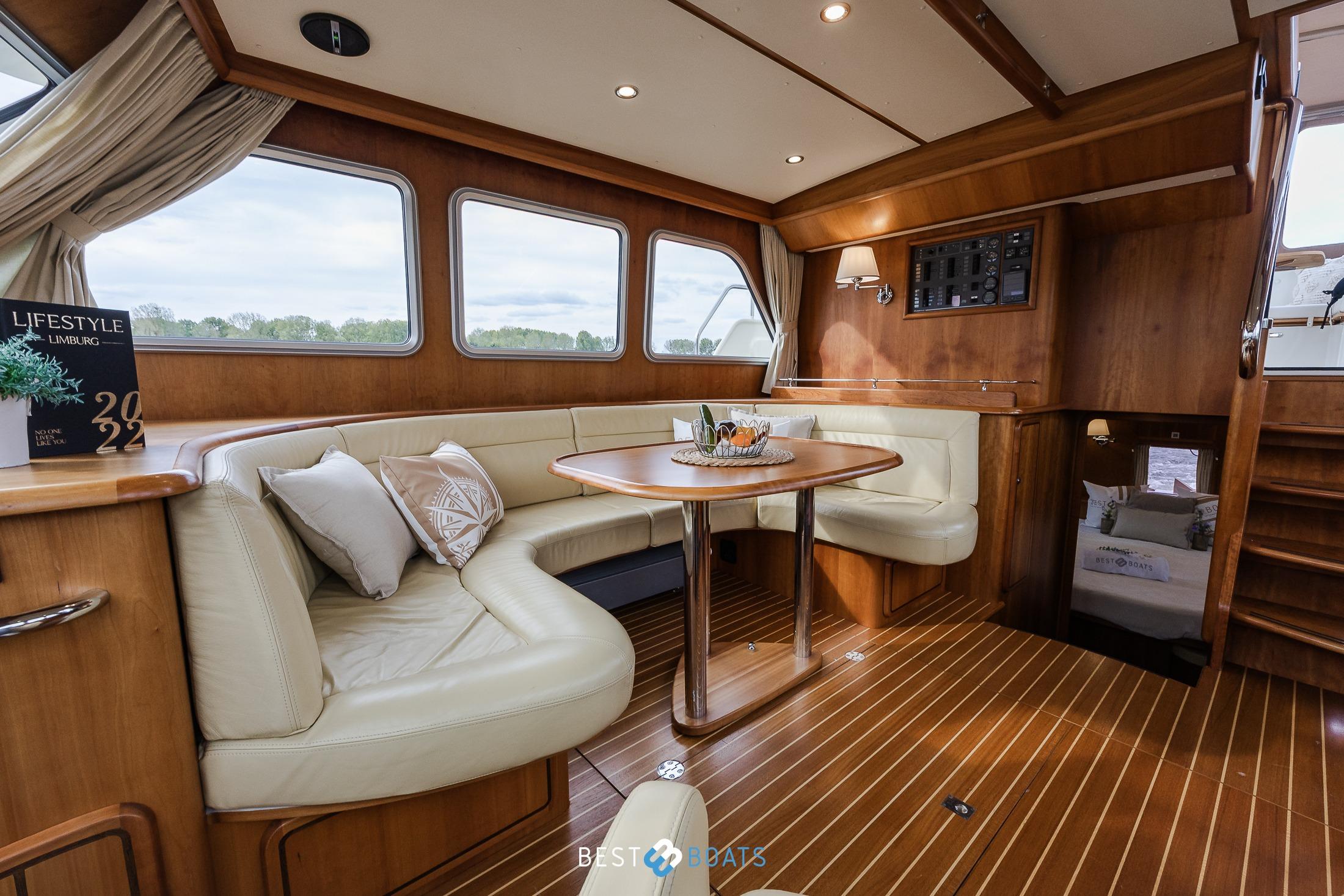 Luxurious interior of 2010 Linssen Grand Sturdy 470 AC Mark II Twin yacht with elegant seating.