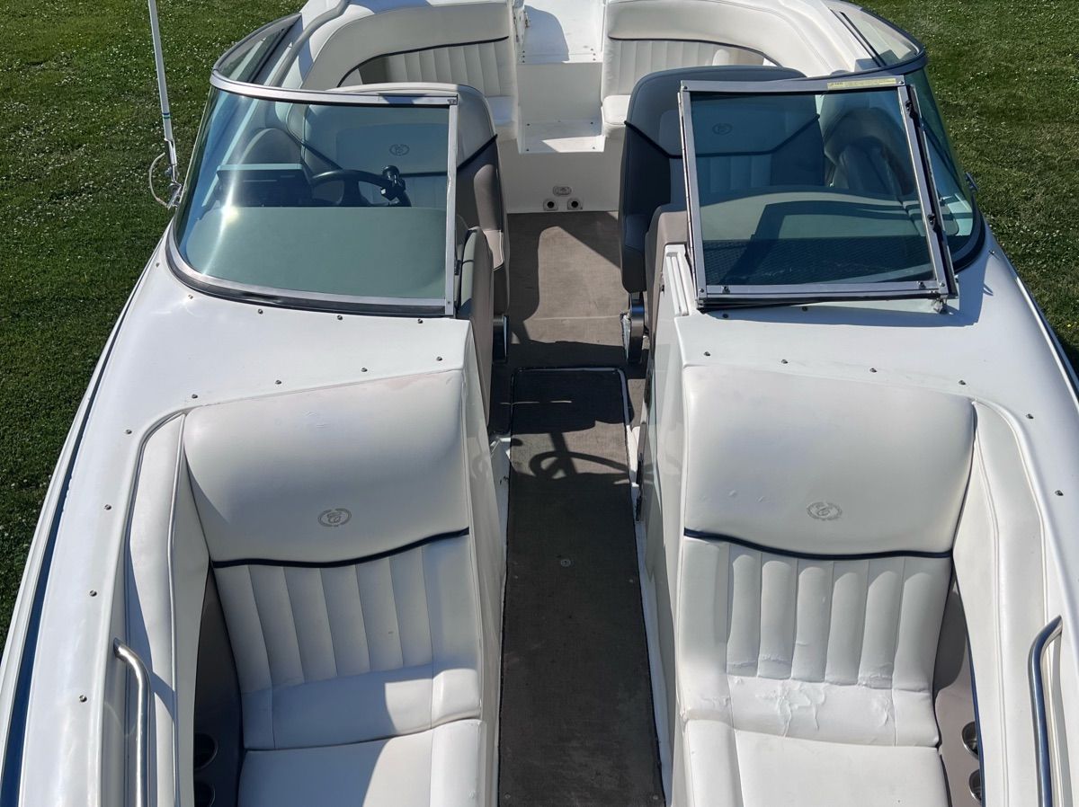 Interior view of a 2003 Cobalt Colbalt 262 boat on grass.