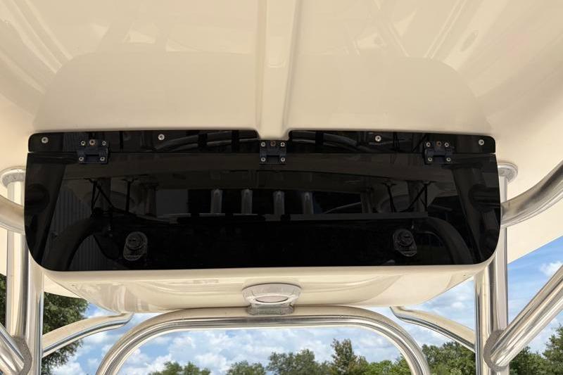 2023 Key West 203 FS boat canopy with sleek black panel and sturdy metal frame.