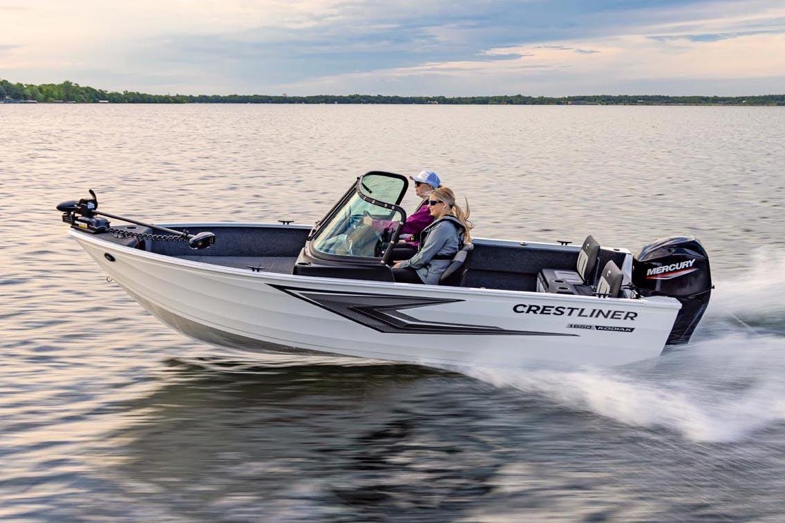 Manufacturer Provided Image: 2026 Crestliner 1650 Kodiak WT boat cruising on a serene lake.