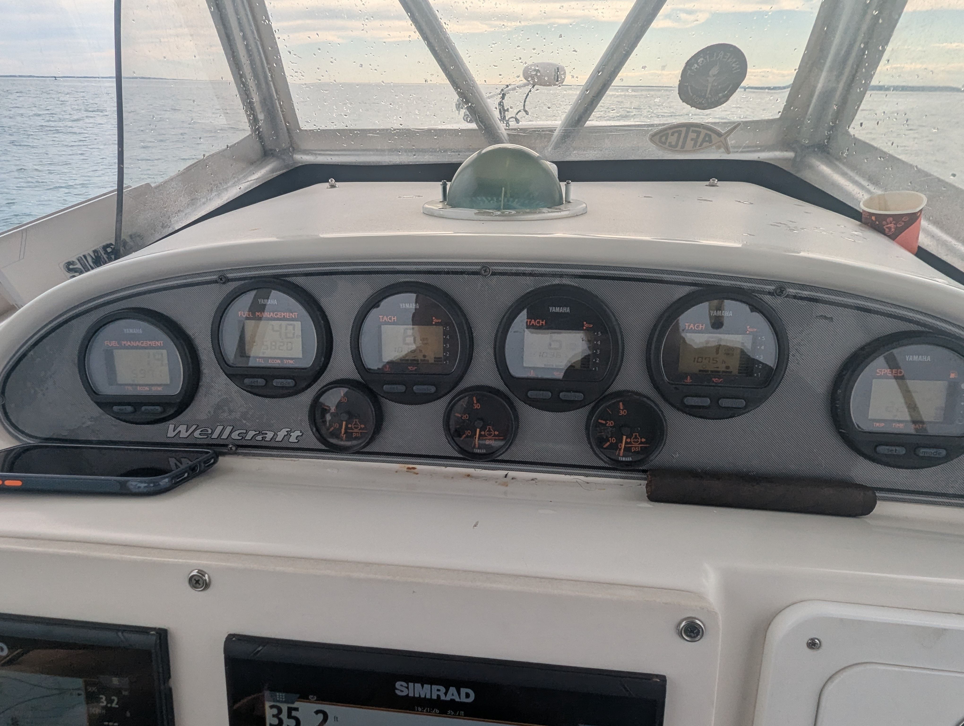 Dashboard of a 2005 Wellcraft 35 CCF boat on the water.