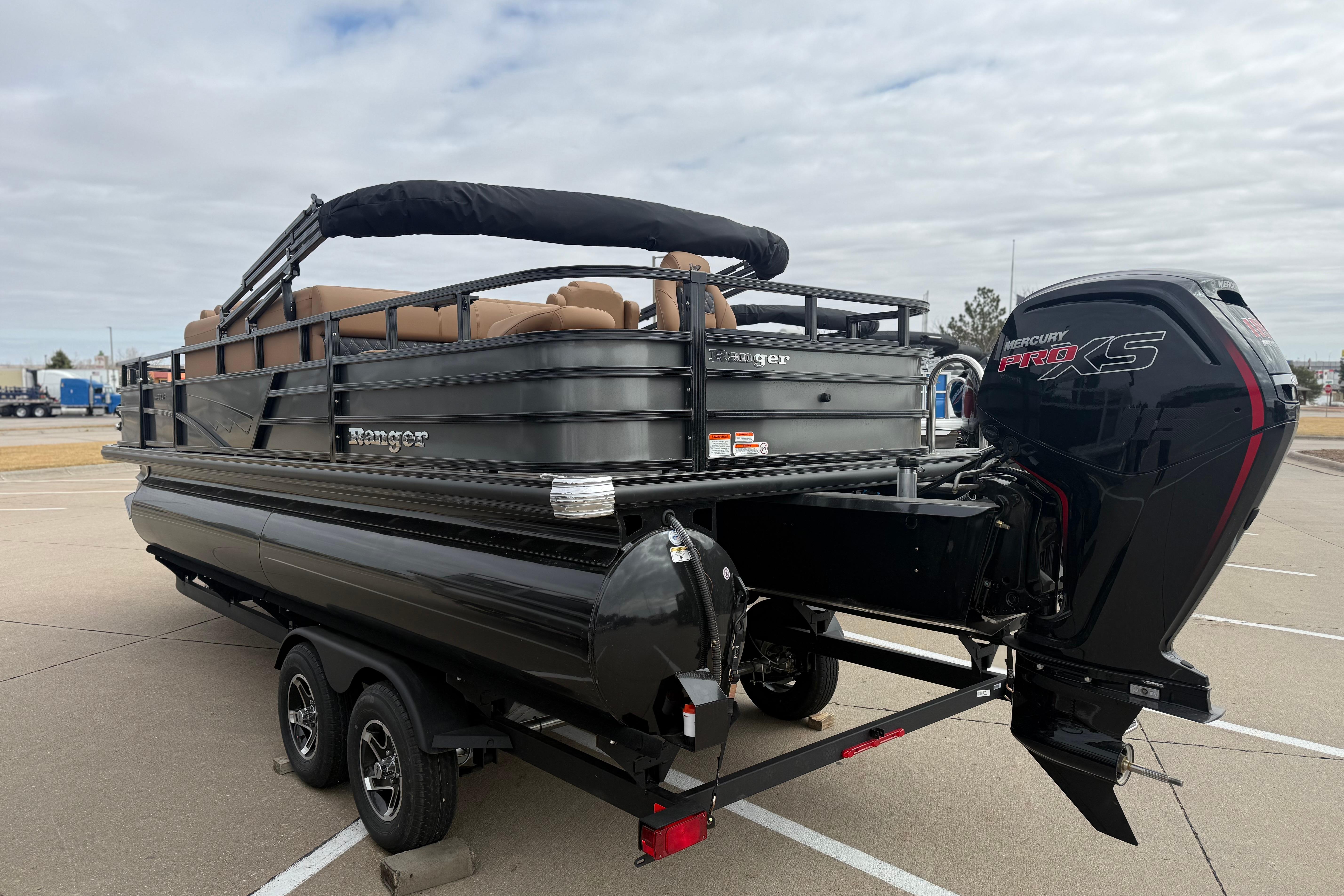2026 Ranger 220F pontoon boat with Mercury Pro XS engine, parked on a trailer.