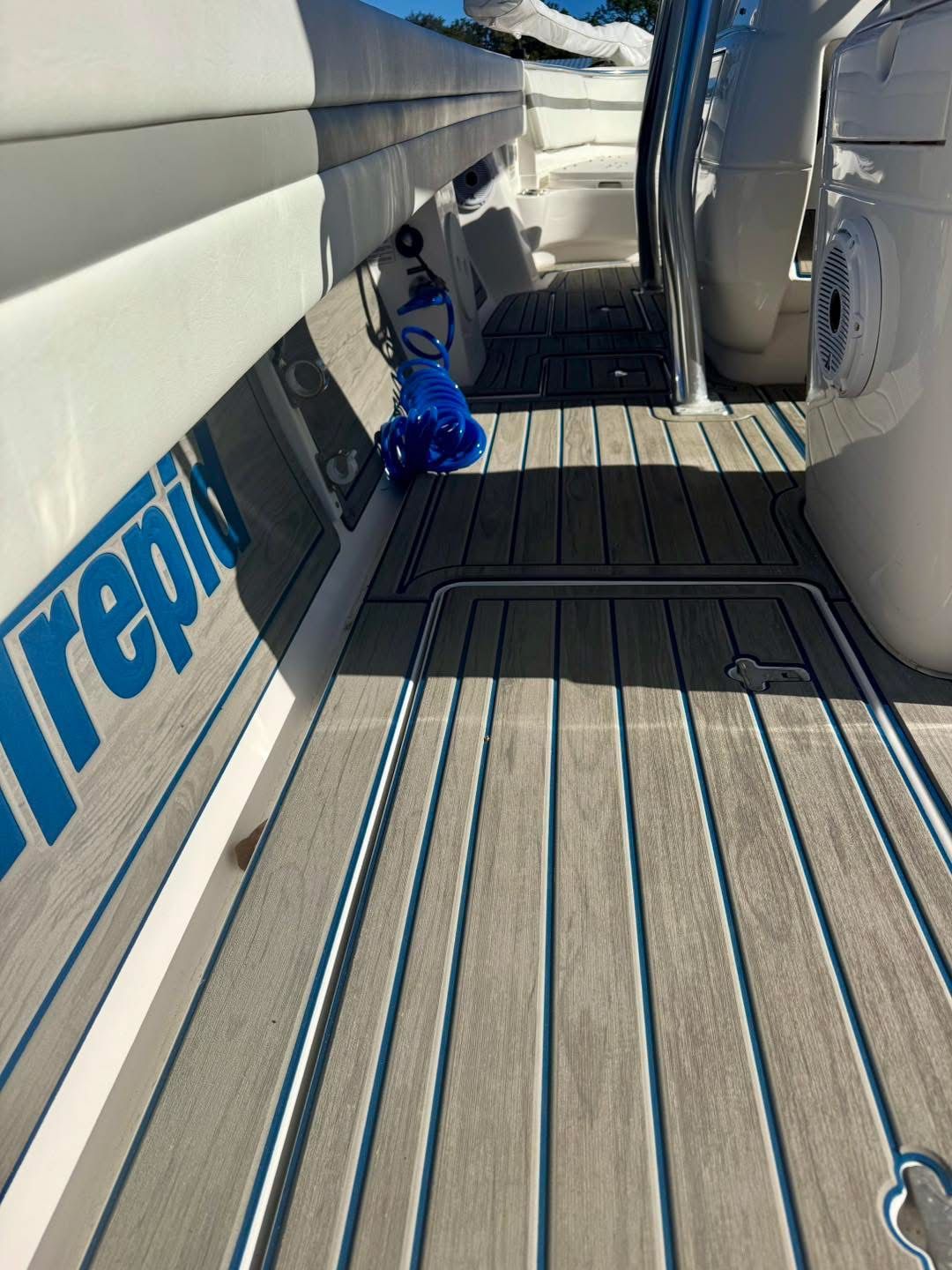 Intrepid 327 Nomad 2021 boat deck with blue accents.