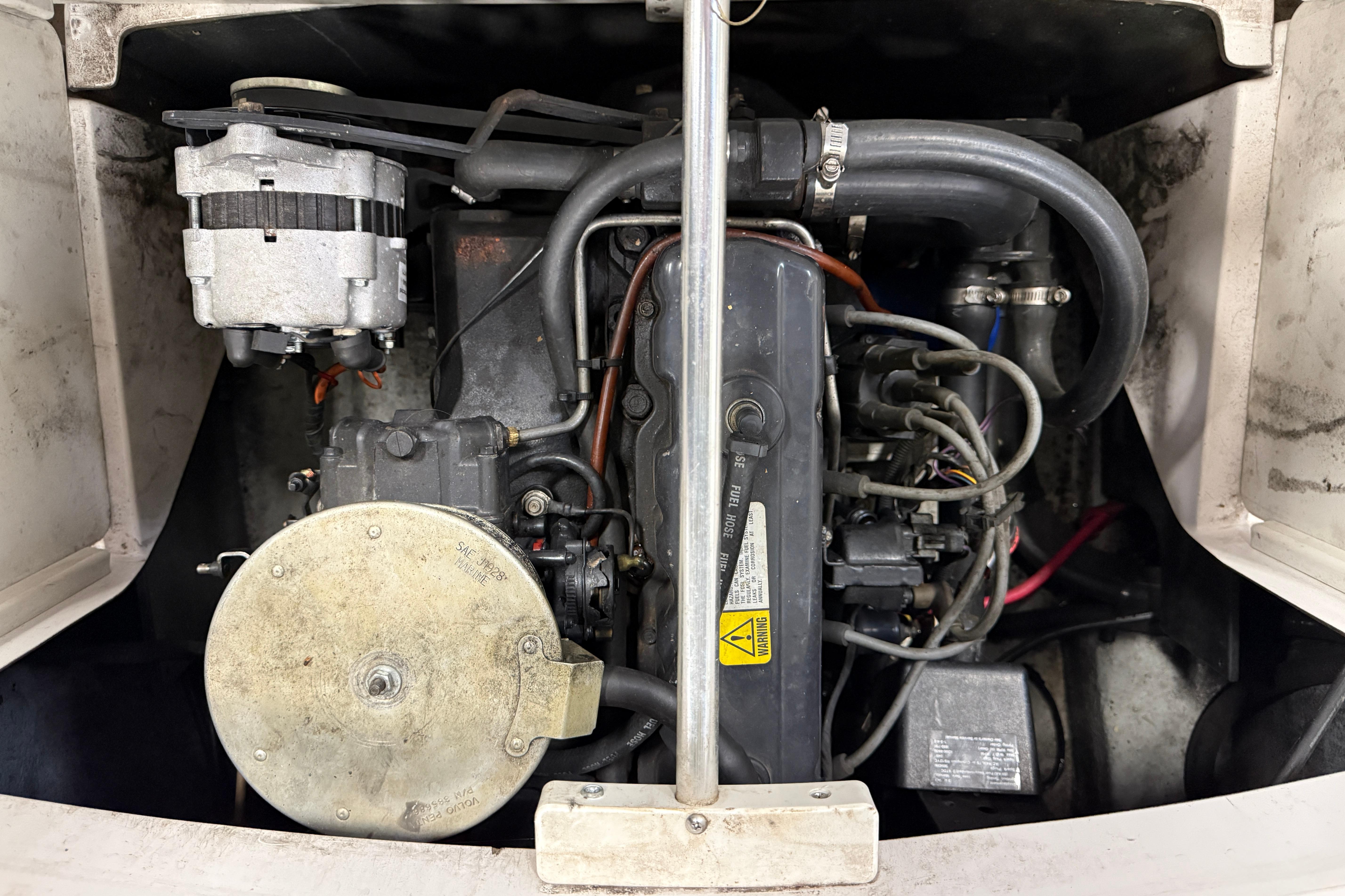 Engine compartment of a 1999 Four Winns 170 Horizon LE boat.