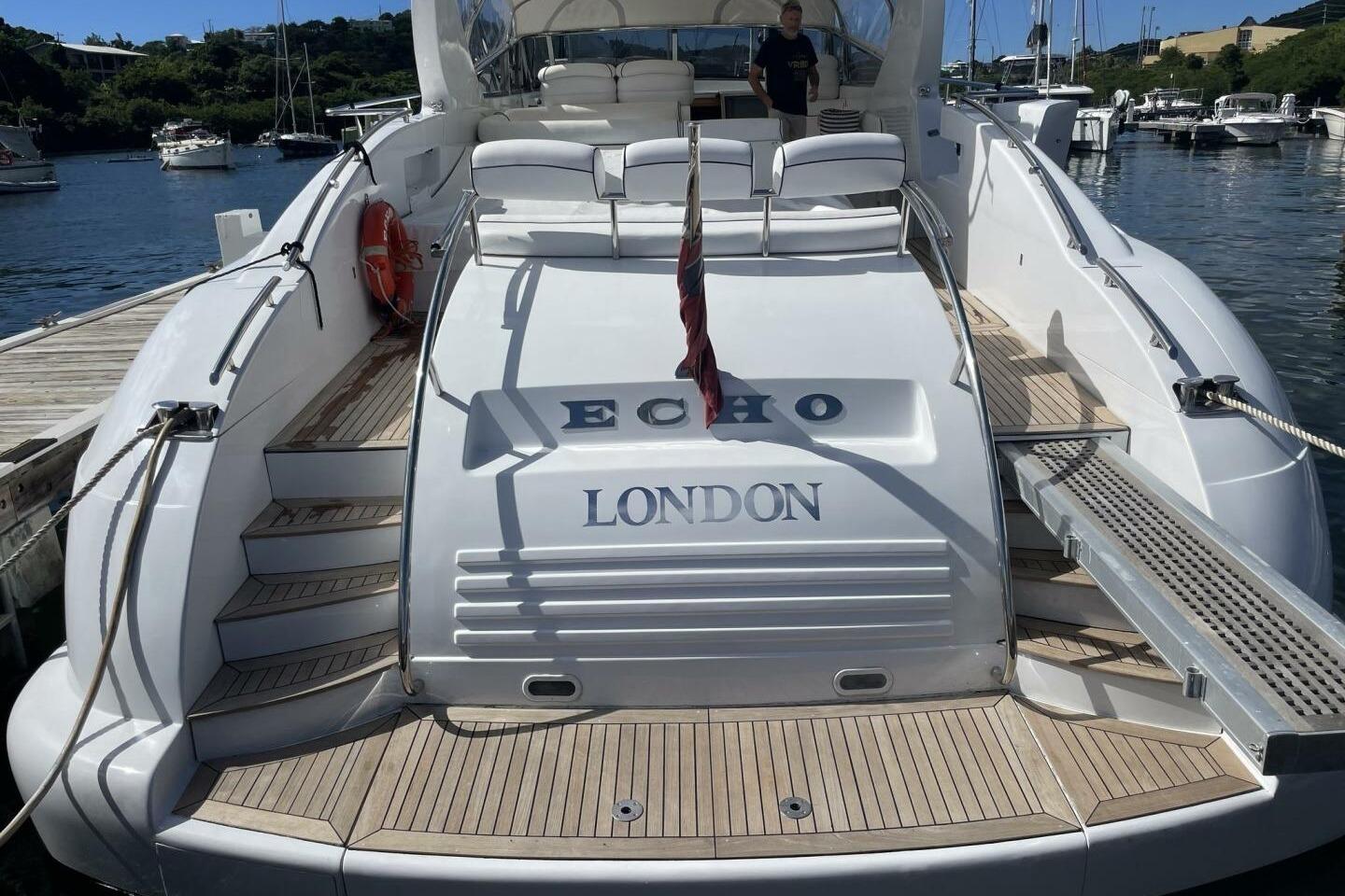 Versilcraft 75 Motoryacht 1996 docked, featuring spacious deck and elegant design.