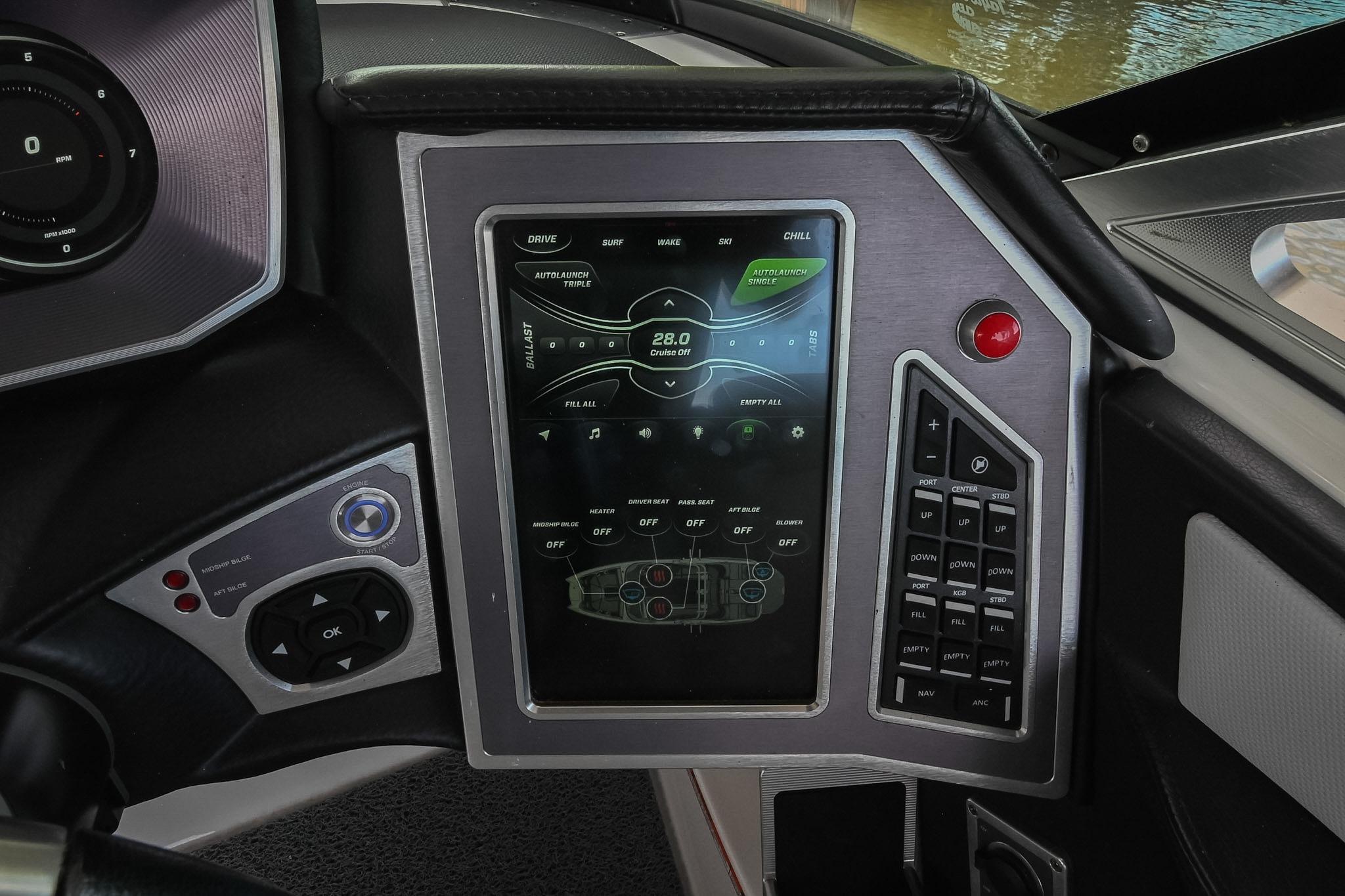 2018 MasterCraft X23 dashboard with touchscreen controls and navigation system.