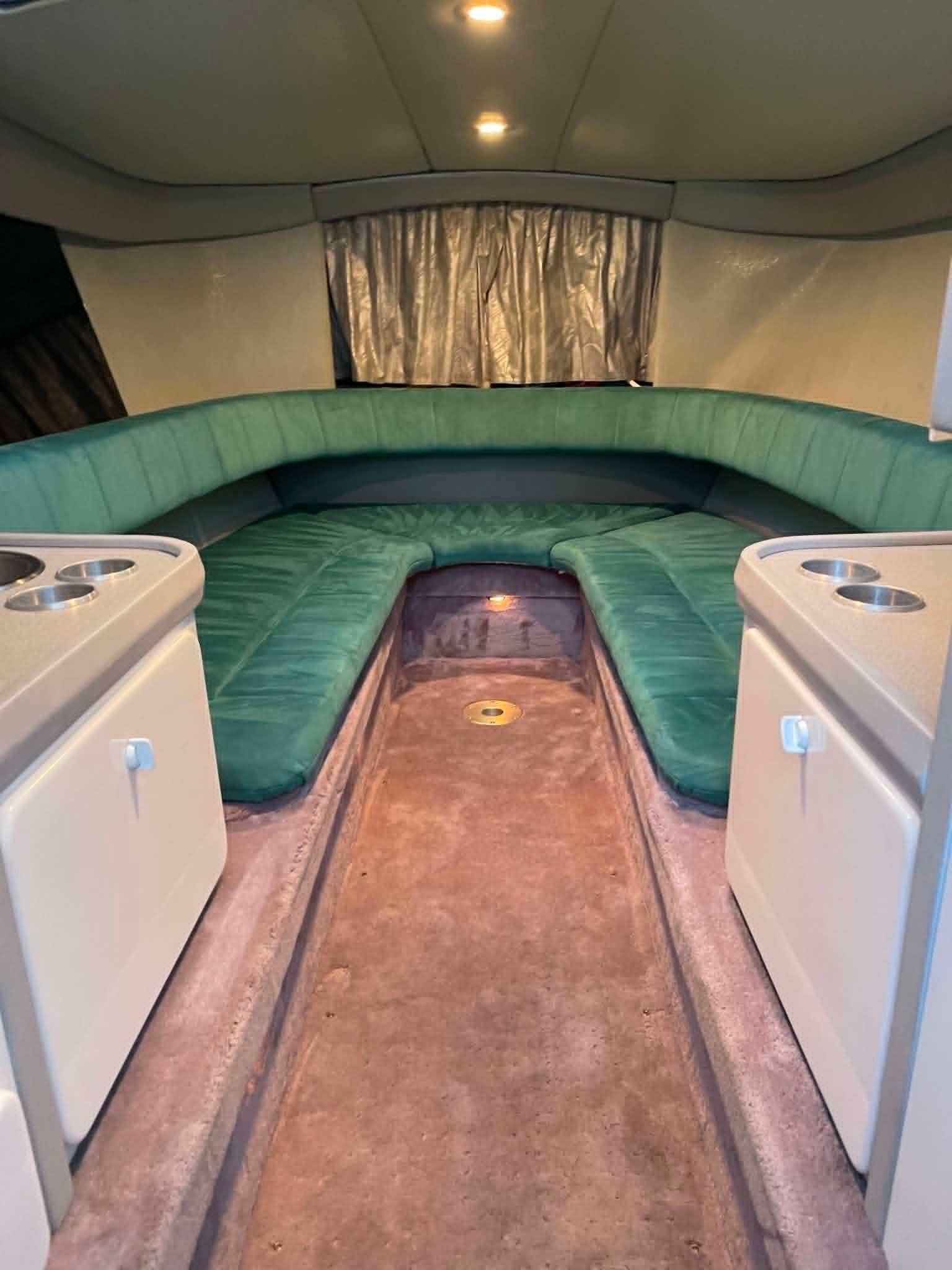 Interior of the 2000 Formula 419 Fast Tech with green upholstery.