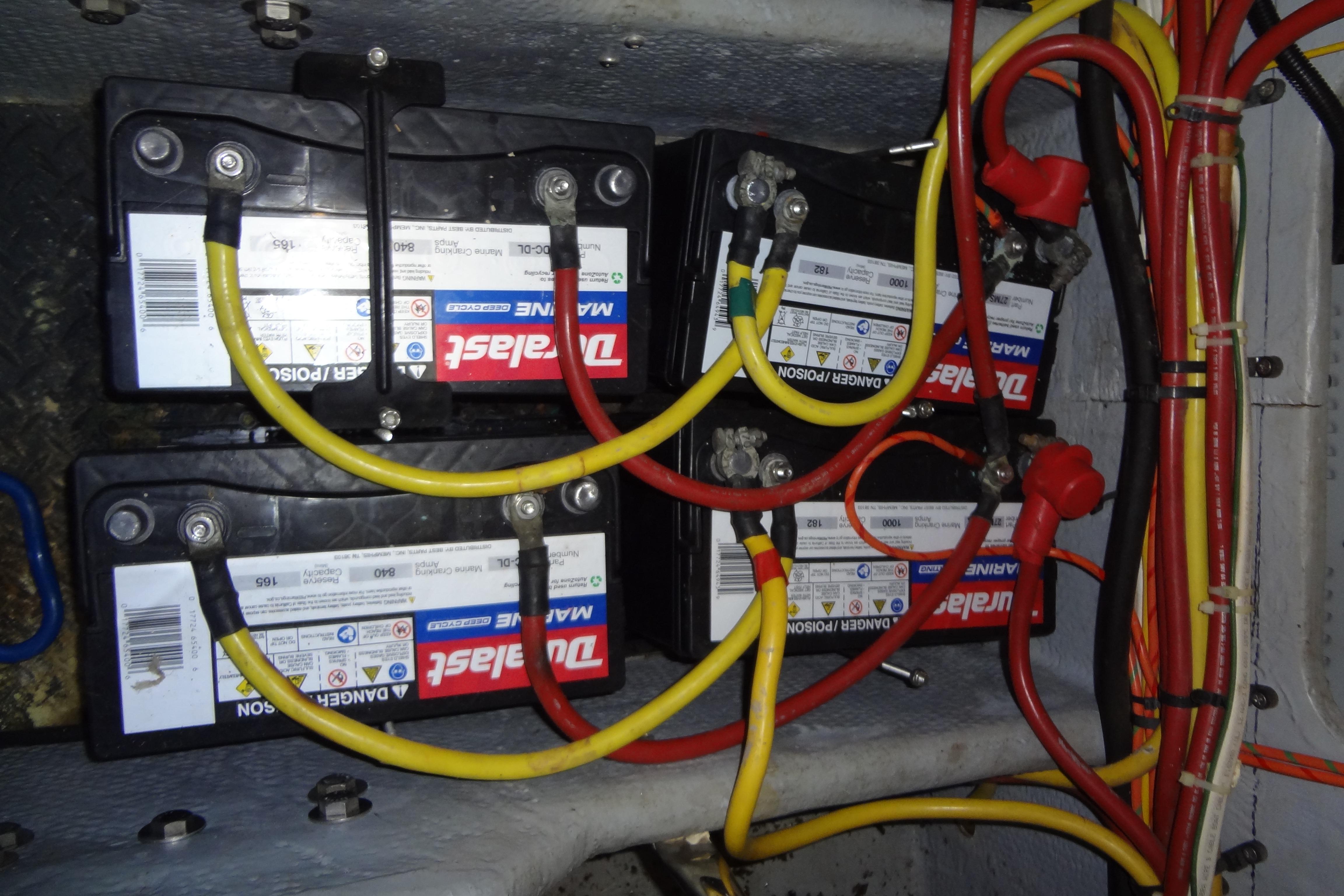 Battery setup in a 2005 Silverton 34 Convertible boat engine compartment.