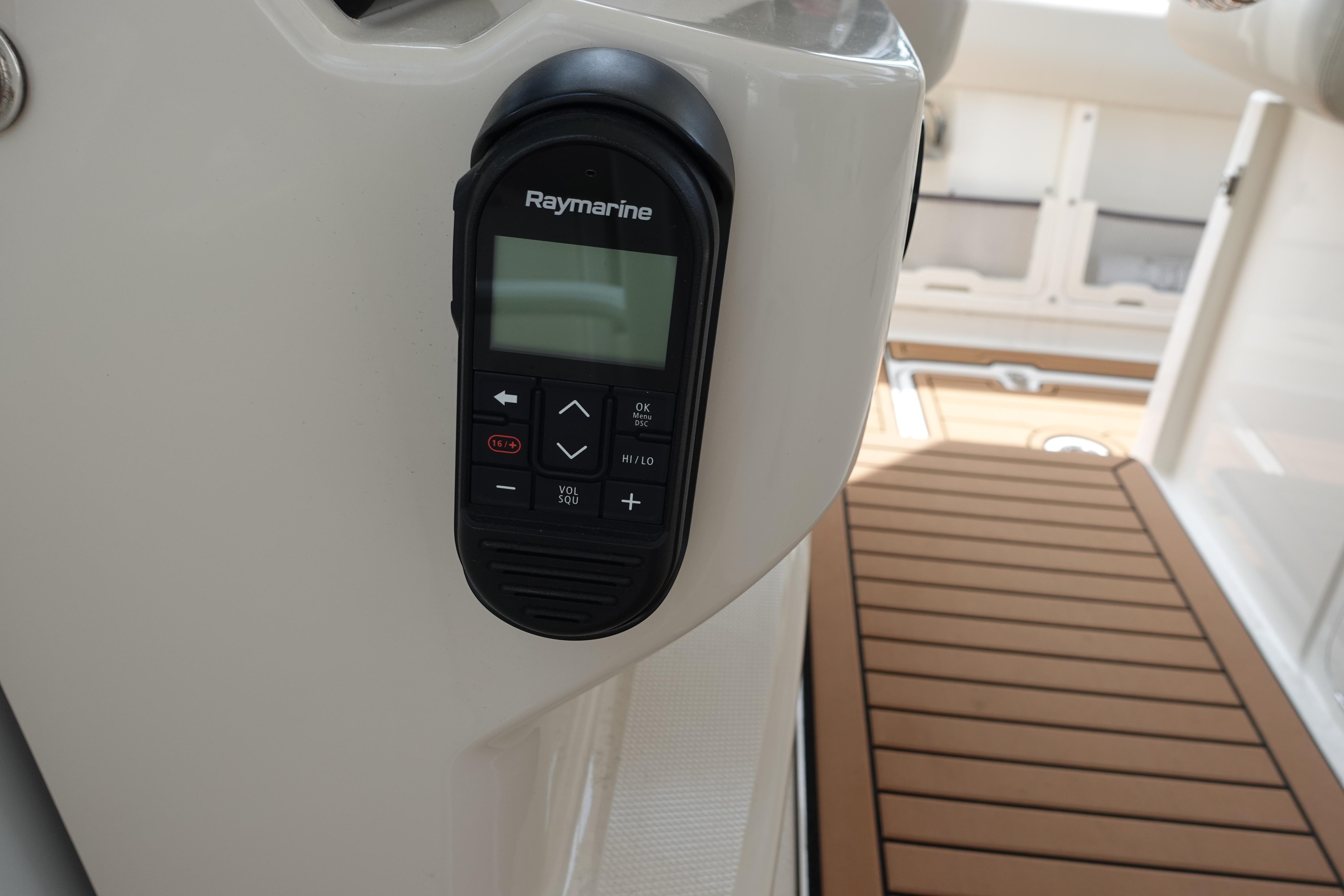 Raymarine control panel on 2020 Boston Whaler 420 Outrage boat, with teak flooring.