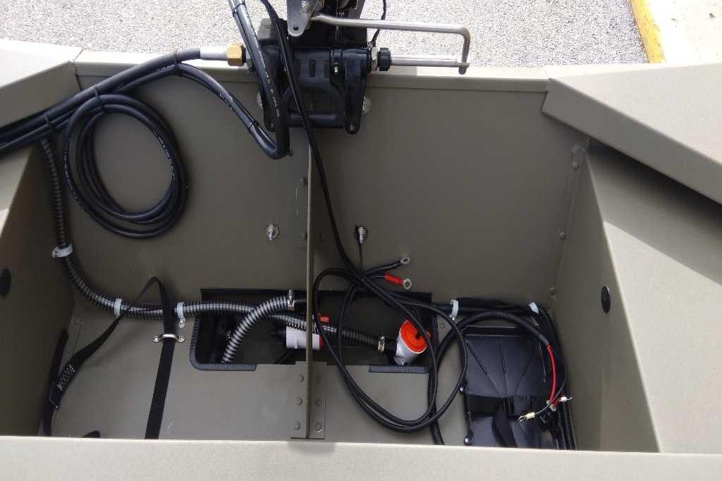 2026 Tracker Grizzly 1648 SC boat interior wiring and components.
