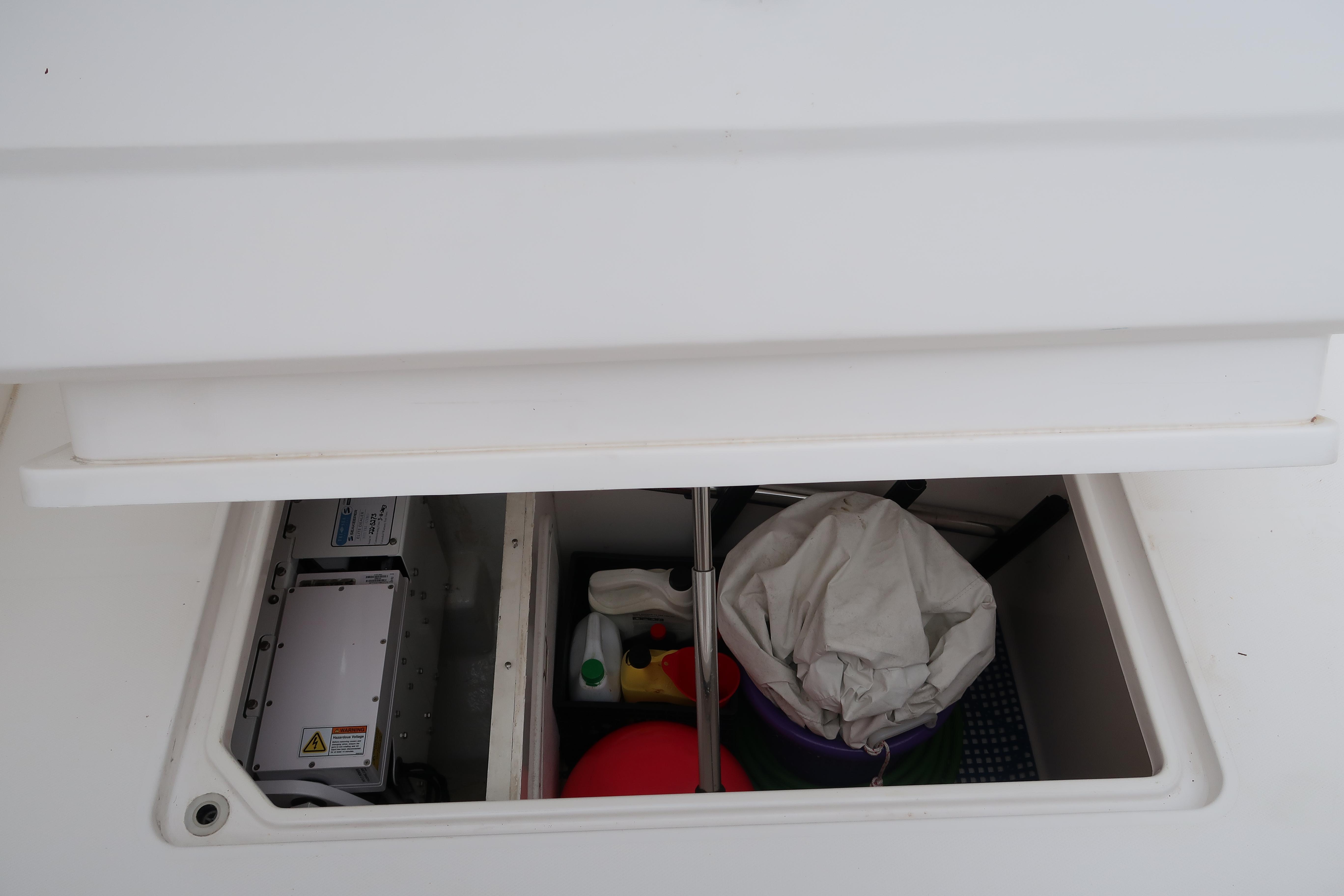 Storage compartment of a 2016 Invincible 42 Open Fisherman boat.