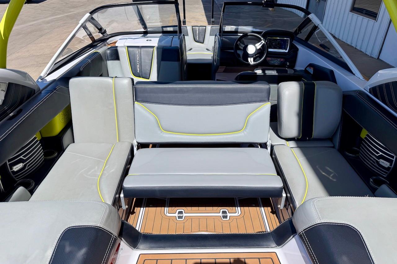 2014 Nautique Super Air Nautique G21 interior with stylish seating and modern dashboard.