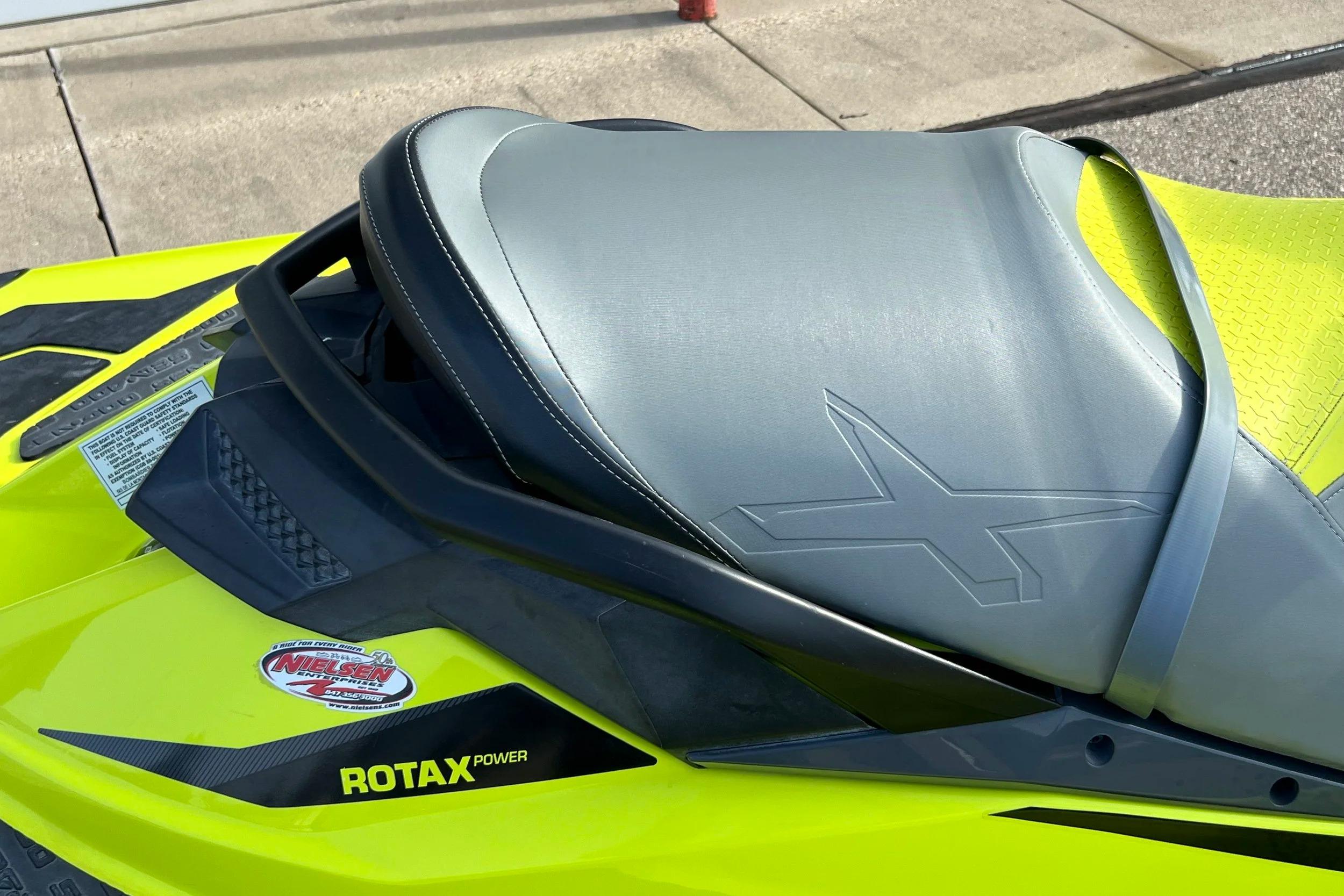 2018 Sea-Doo RXP-X 300 jet ski seat with Rotax power branding, vibrant yellow design.