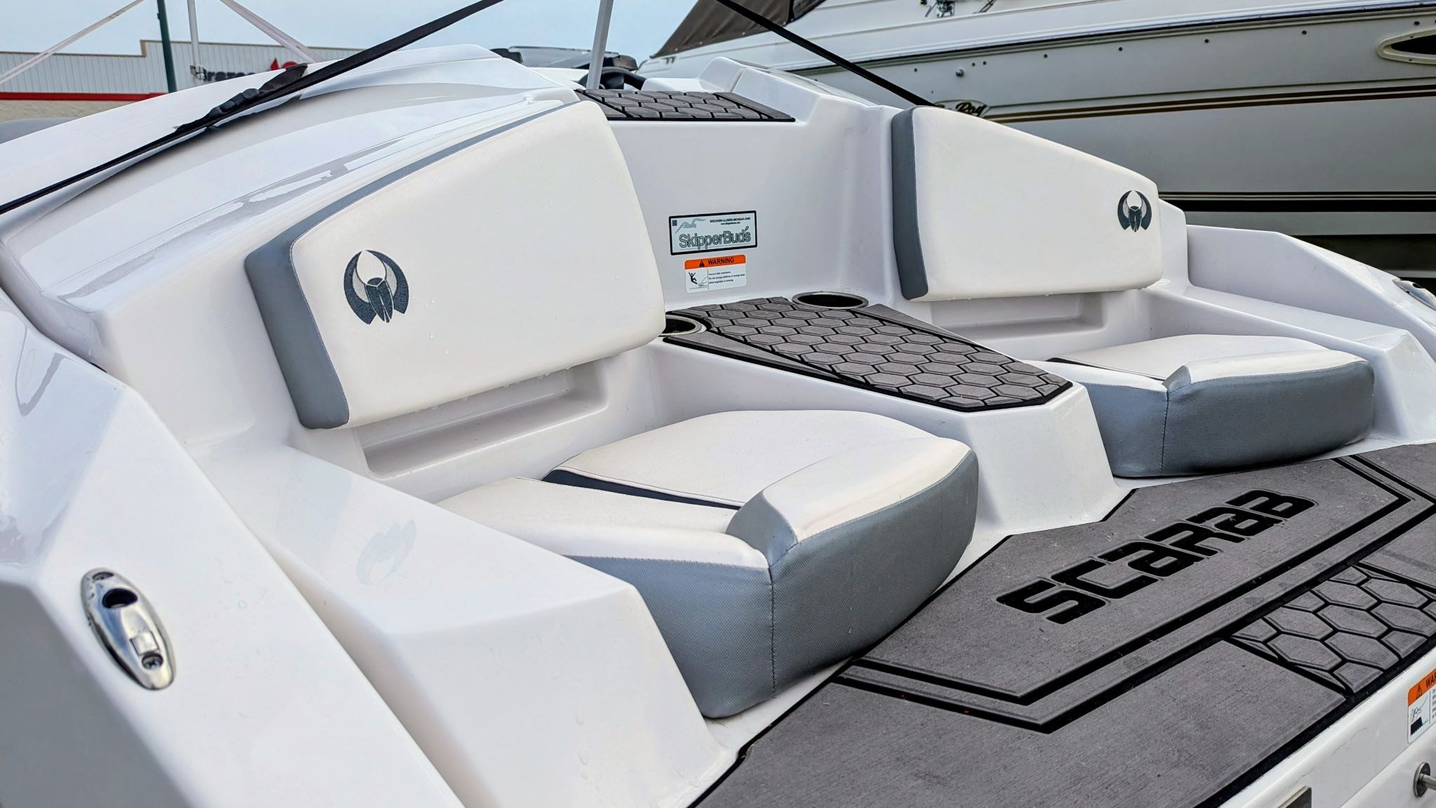 2017 Scarab 165 H.O. boat interior with gray upholstery.
