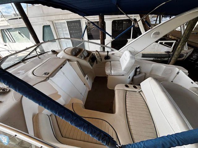 Interior of a 2002 Bayliner 2855 yacht docked at marina.
