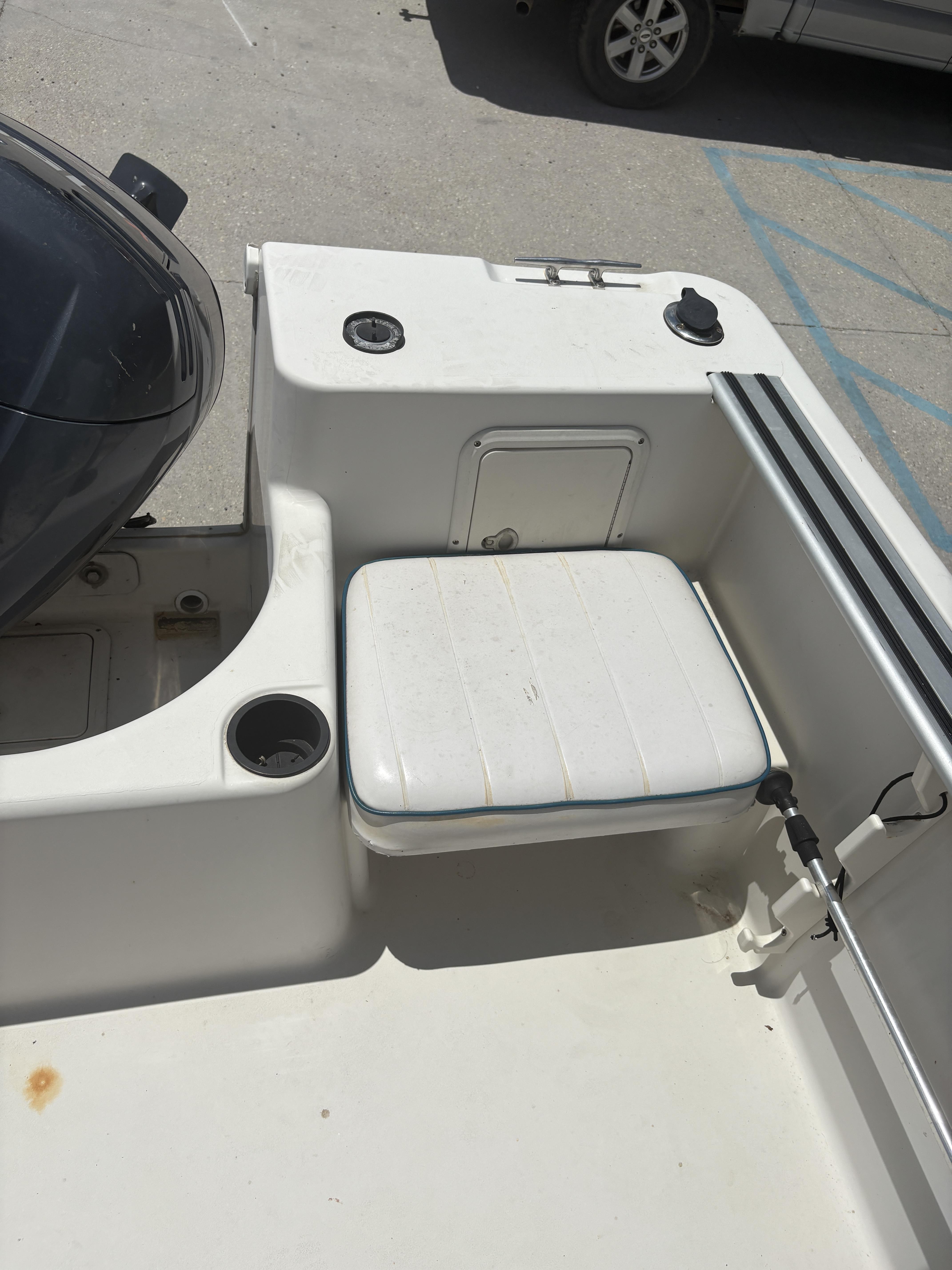 1996 Pro-Line 202 boat interior with seating and storage compartments.