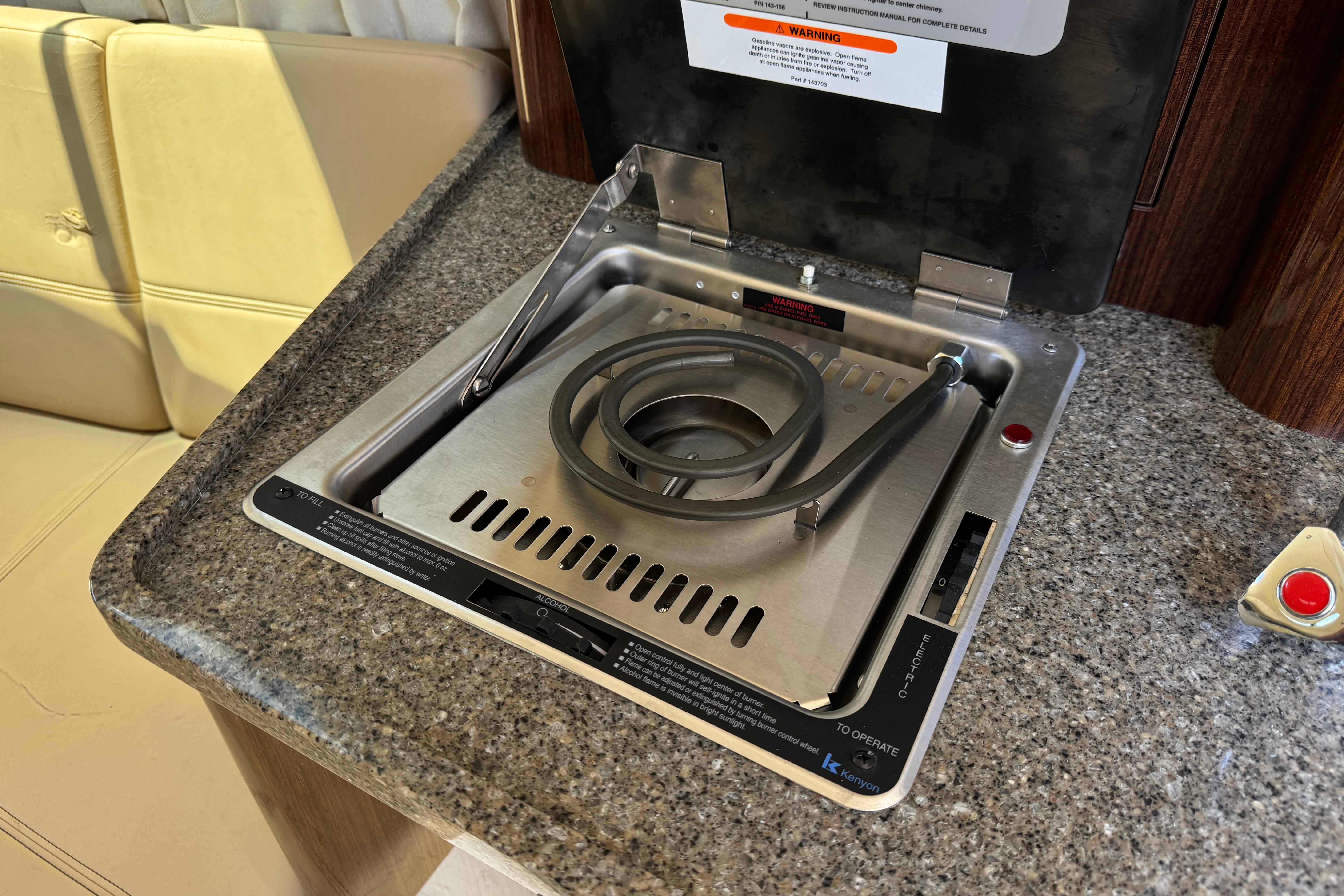 Built-in stove on 2013 Regal 28 Express boat with granite countertop.