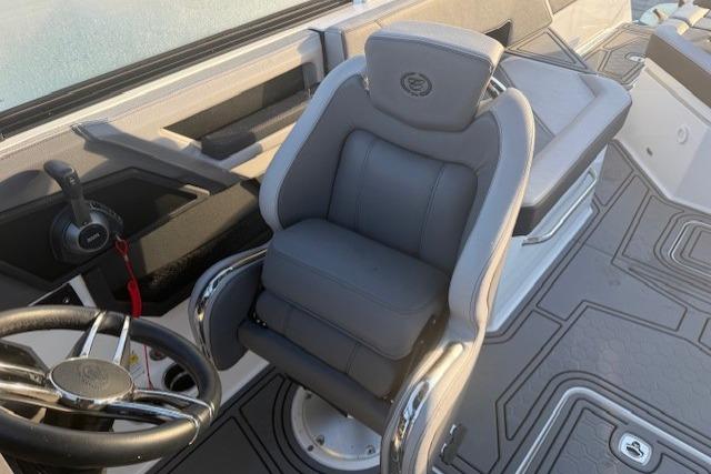 2023 Cobalt R6 Surf boat interior with sleek steering and comfortable seating.