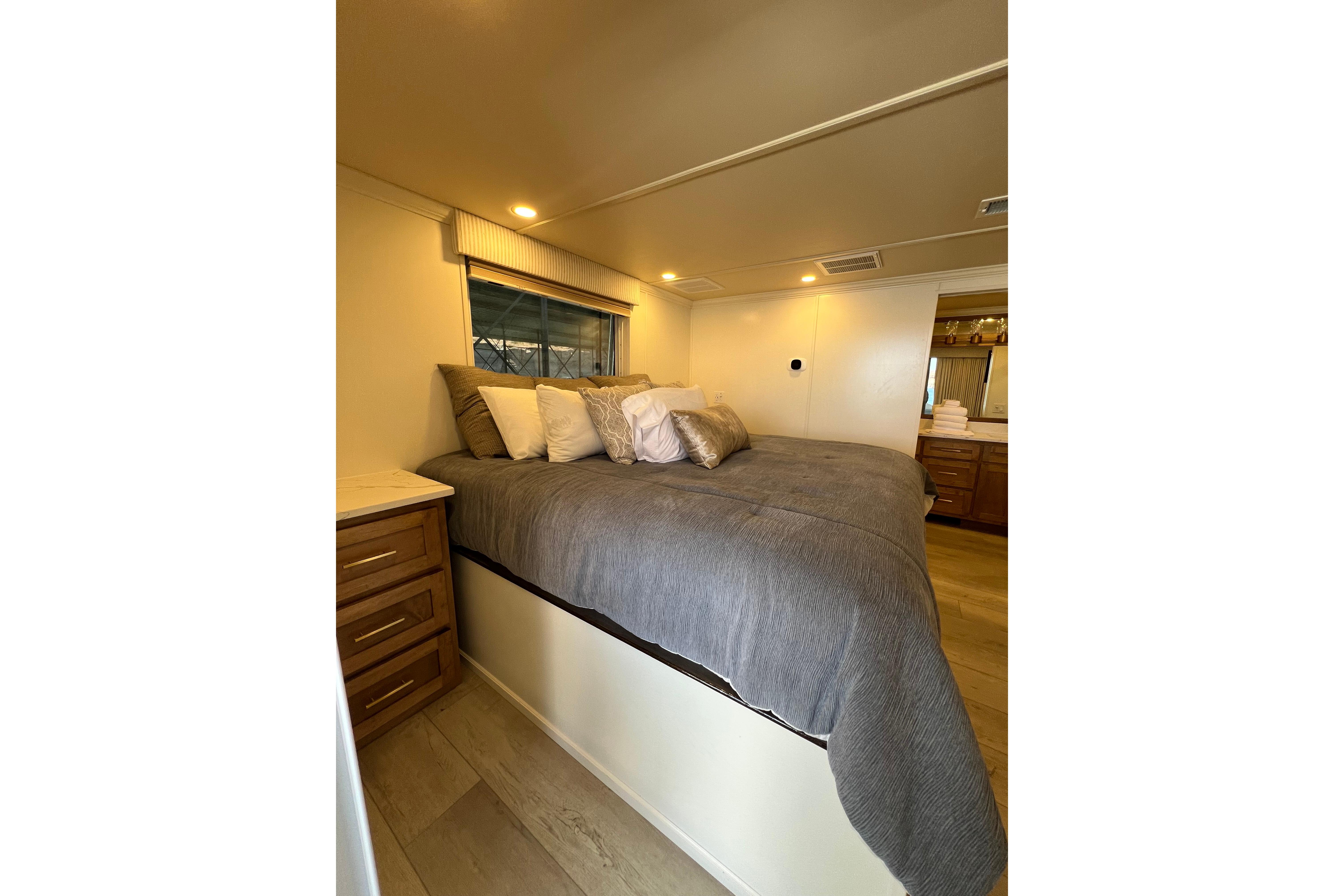 Cozy bedroom in 2025 Sumerset Excellence Multiple Shares houseboat with plush bedding.
