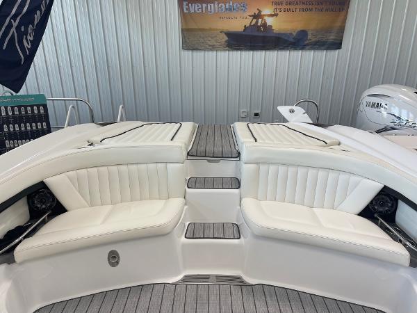 2005 Cobalt 343 boat interior with white seating and wood accents.