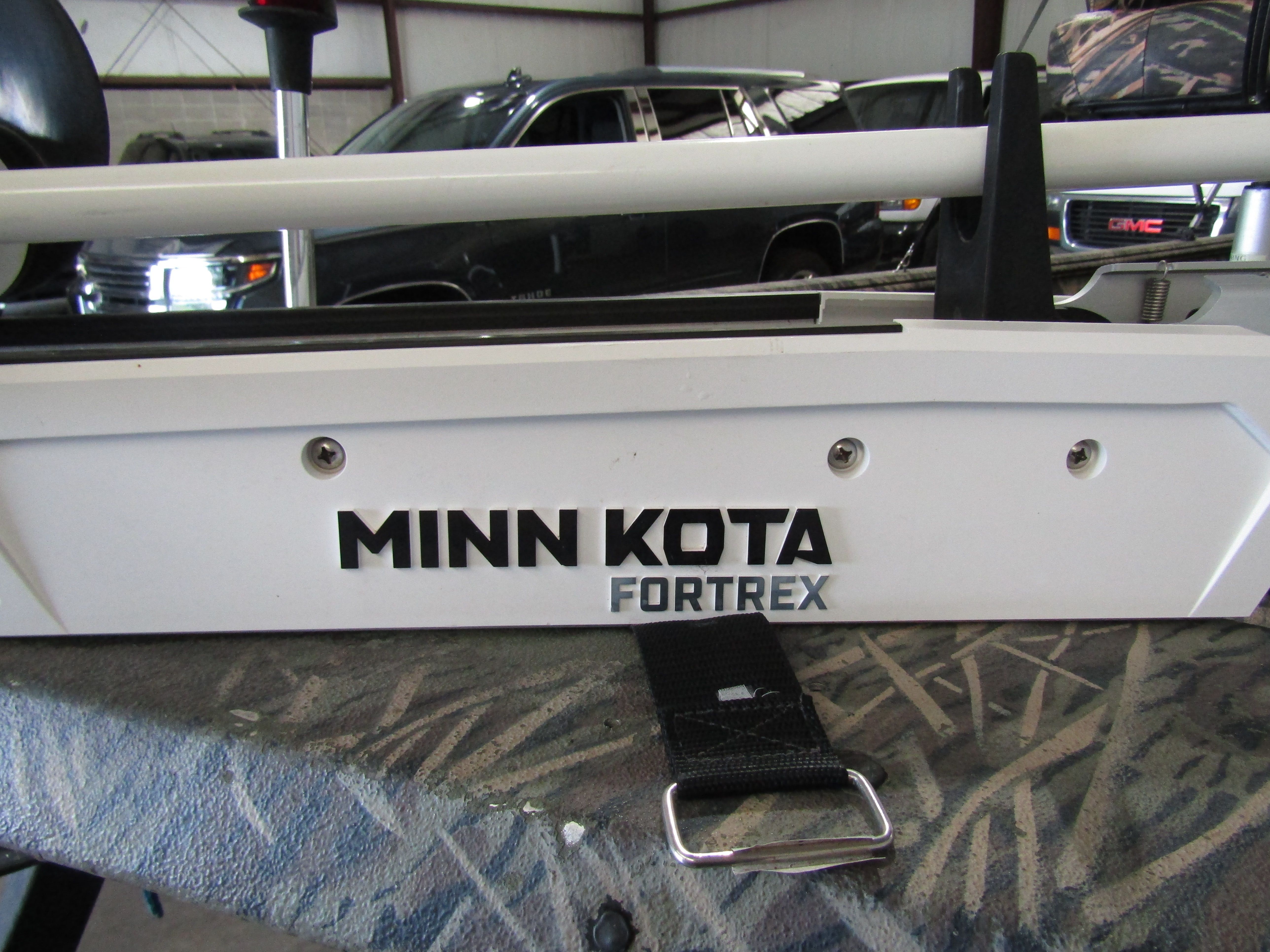 Close-up of a Minn Kota Fortrex trolling motor on a boat.