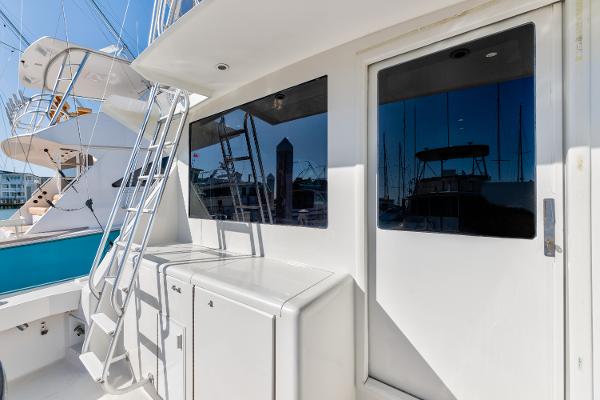 1999 Viking 47 Convertible yacht exterior with ladder and storage compartments.